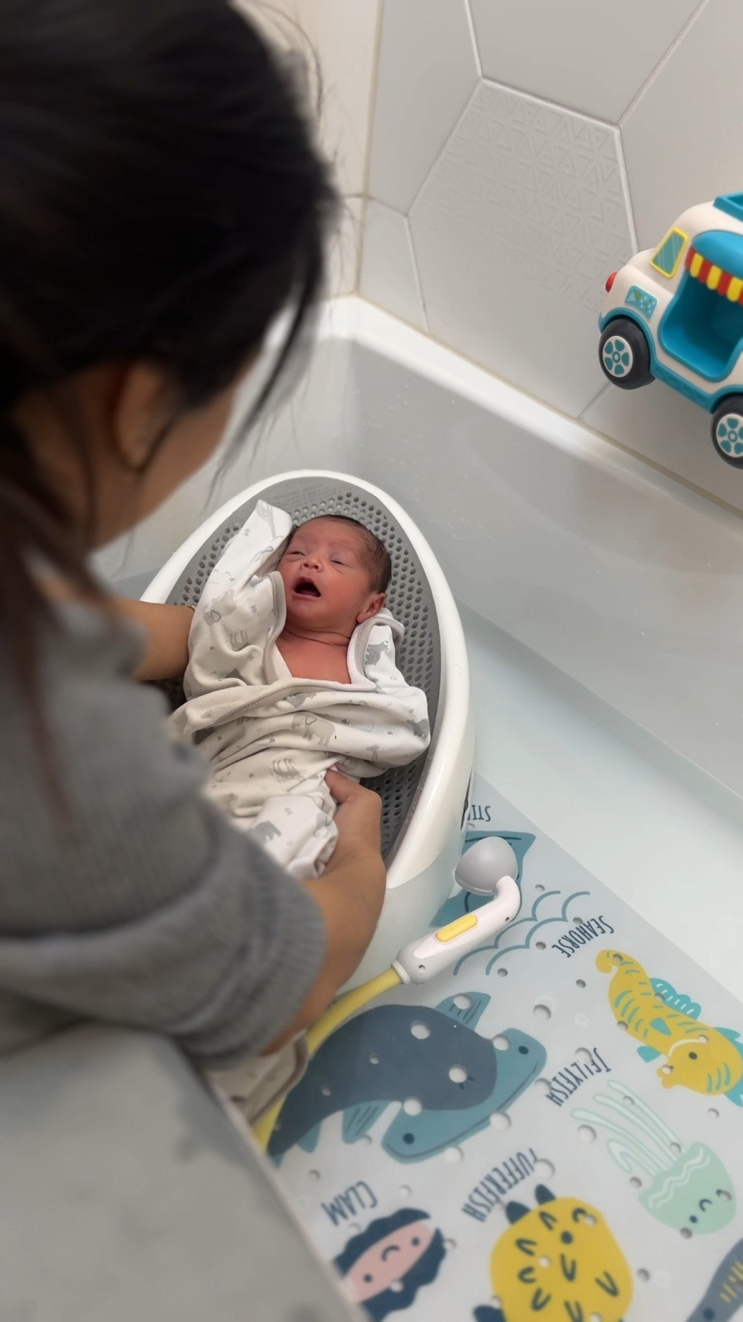 “Bath time can be intimidating as a new mom! 🛁💖 I remember feeling anxious when my little ones would cry during their baths, but I’ve discovered some tips that turned it into a calming experience for everyone.
✨ Here’s what I found helpful:
1.	Wrap them in a towel while in the tub. It helps them feel secure and less exposed.
2.	Offer a bottle before and after the bath to keep them content and relaxed.
3.	A tiny portable shower head is a total game changer! So much easier to wash those little heads and it’s soothing for them too!
4.	If you can, invest in a towel warmer! My kids love snuggling in a warm towel after their bath. It’s made such a difference!
Let’s make bath time a blissful bonding moment! 💕
#NewMom #MomTips #BathTime #BabyCare #MomLife #ParentingHacks #RelaxingBath #HappyBaby #TowelWarmer #MomCommunity”

#LTKBaby #LTKFamily #LTKBump