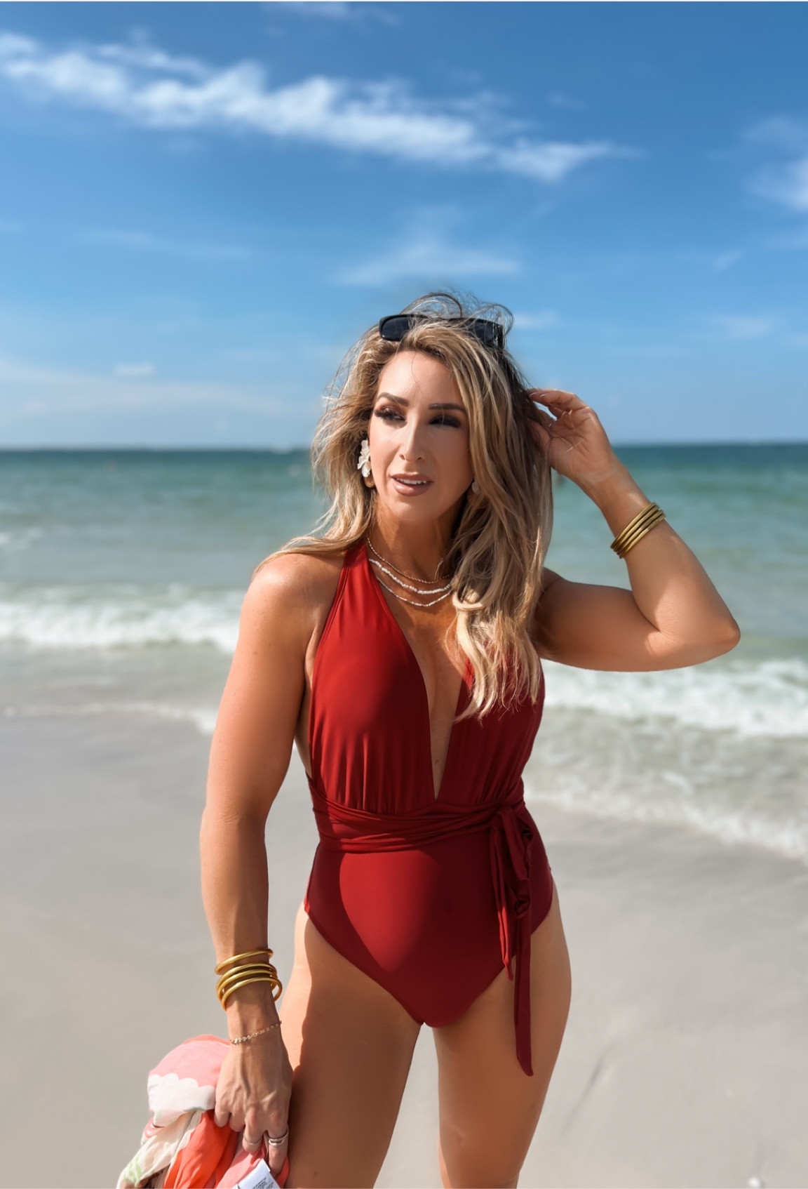 My tried and true swimsuit style that just flatters with the wrap belt. I own it in 4 colors. 🫢🤌🏼

One piece red wrap swimsuit, sarong, swimsuit coverup 

#LTKStyleTip #LTKFindsUnder50 #LTKSwim