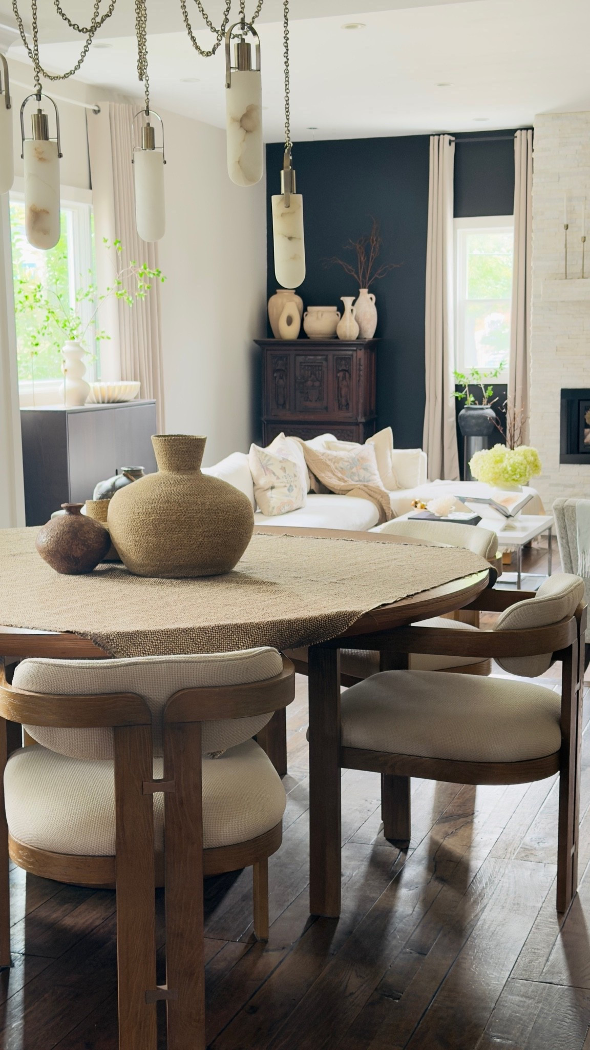 Bring an elevated look to a space. Beautiful vases, modern dining chairs, round table with stunning lighting for the perfect finishing touch.

#LTKHome #LTKSaleAlert