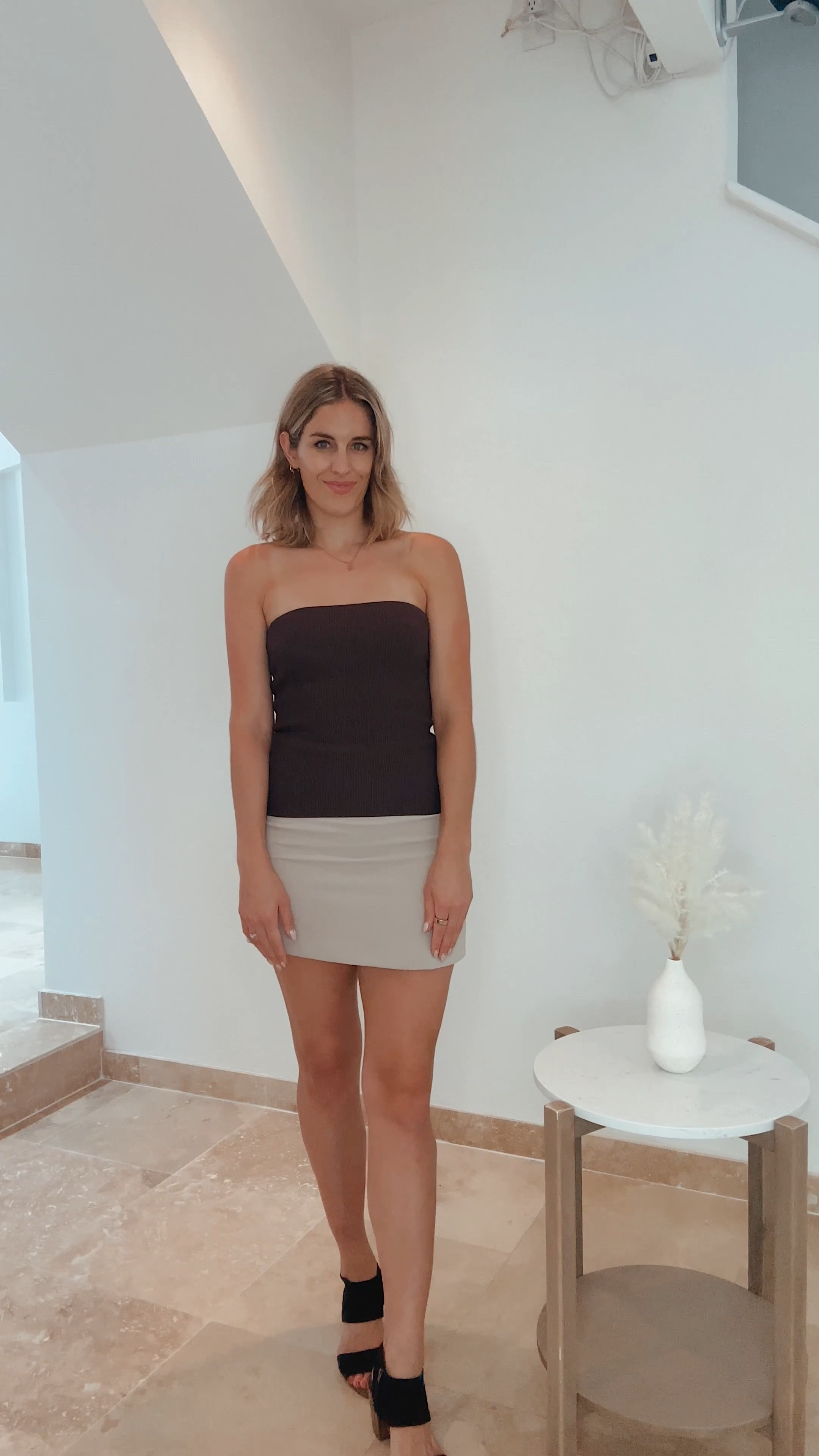 Brown tube top and tan mini skirt from Aritzia 

#LTKFindsUnder100 #LTKSummerSales