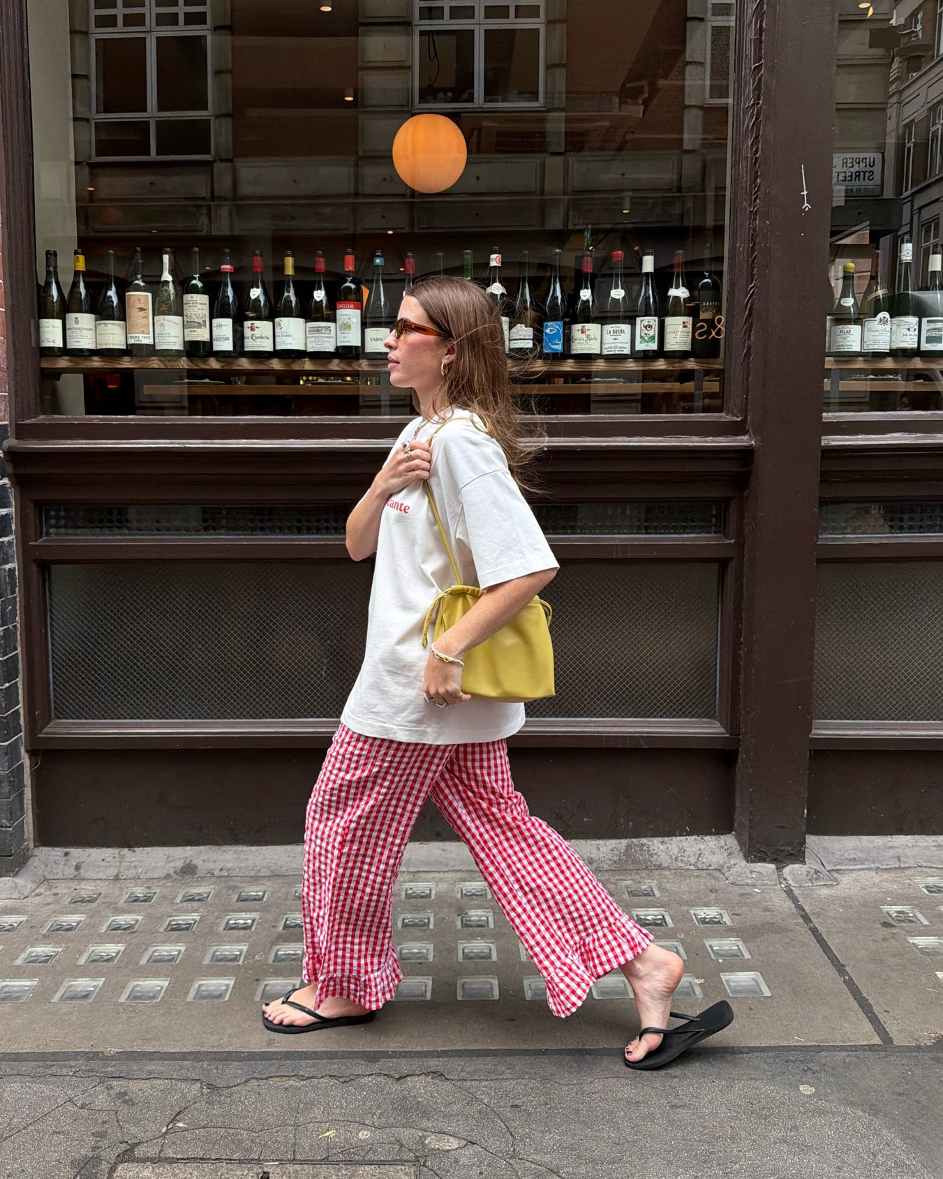 Graphics tee, gingham trousers, red trousers, Havaianas, summer outfit, casual outfit, baggy t shirt

#LTKsummer #LTKuk #LTKeurope