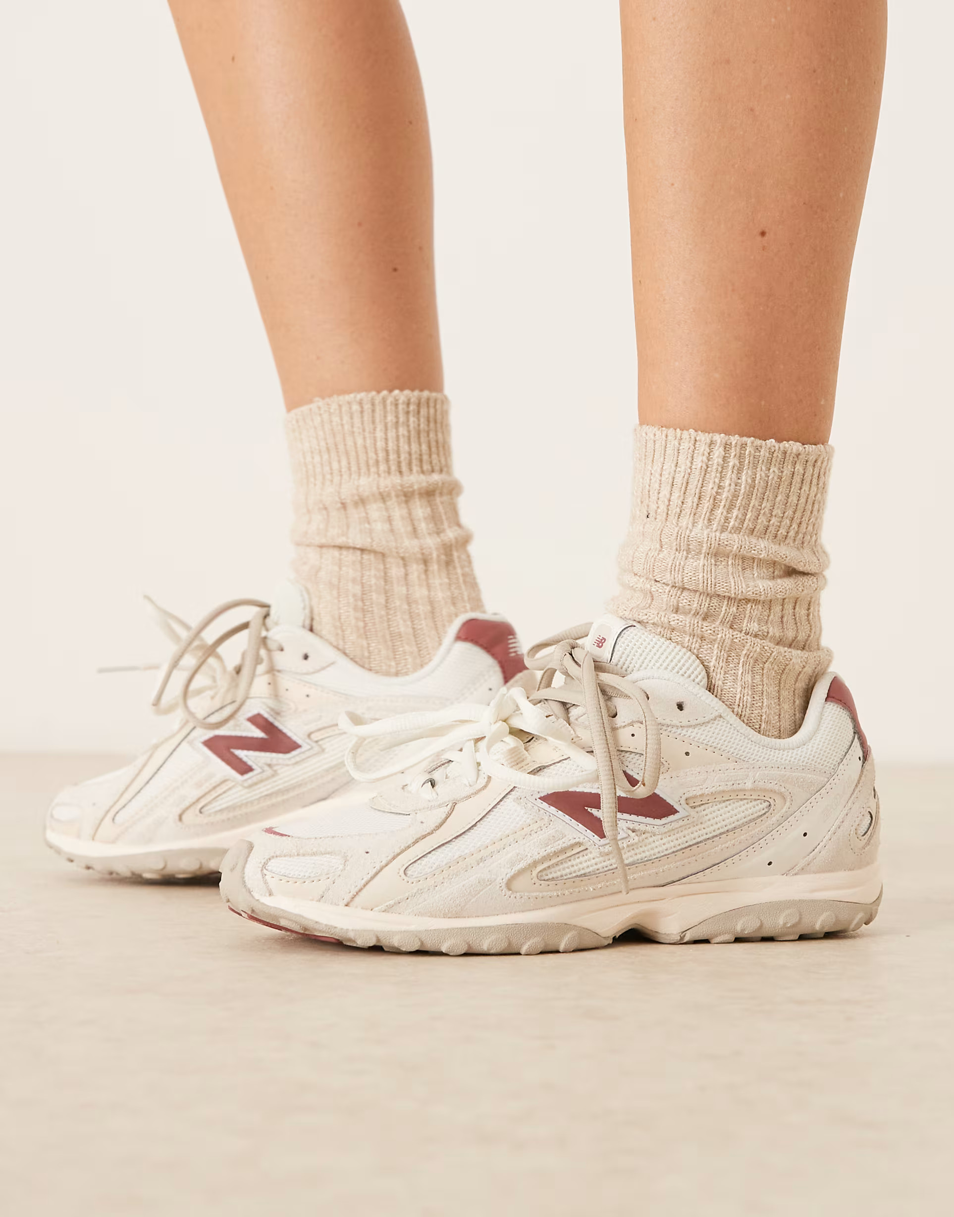New Balance 204L trainers in off white and red suede | ASOS (Global)