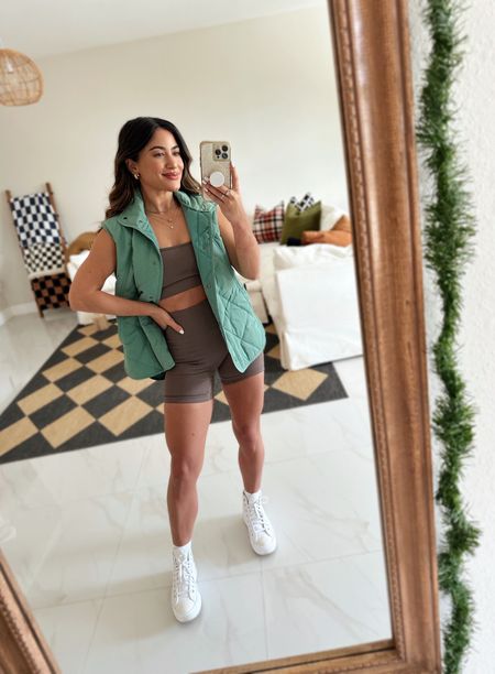 OOTD 🤎

I have this sports a bra and shorts set in 2 colors, it’s great quality and comfortable.

This vest is available in lots of colors and is a great lightweight layering option.

Amazon finds, Amazon fashion, workout wear, gym outfits, affordable, petite outfits, fall style, bike shorts, matching set,    Athleisure, fall outfits. 

#LTKfitness #LTKfindsunder100 #LTKHolidaySale