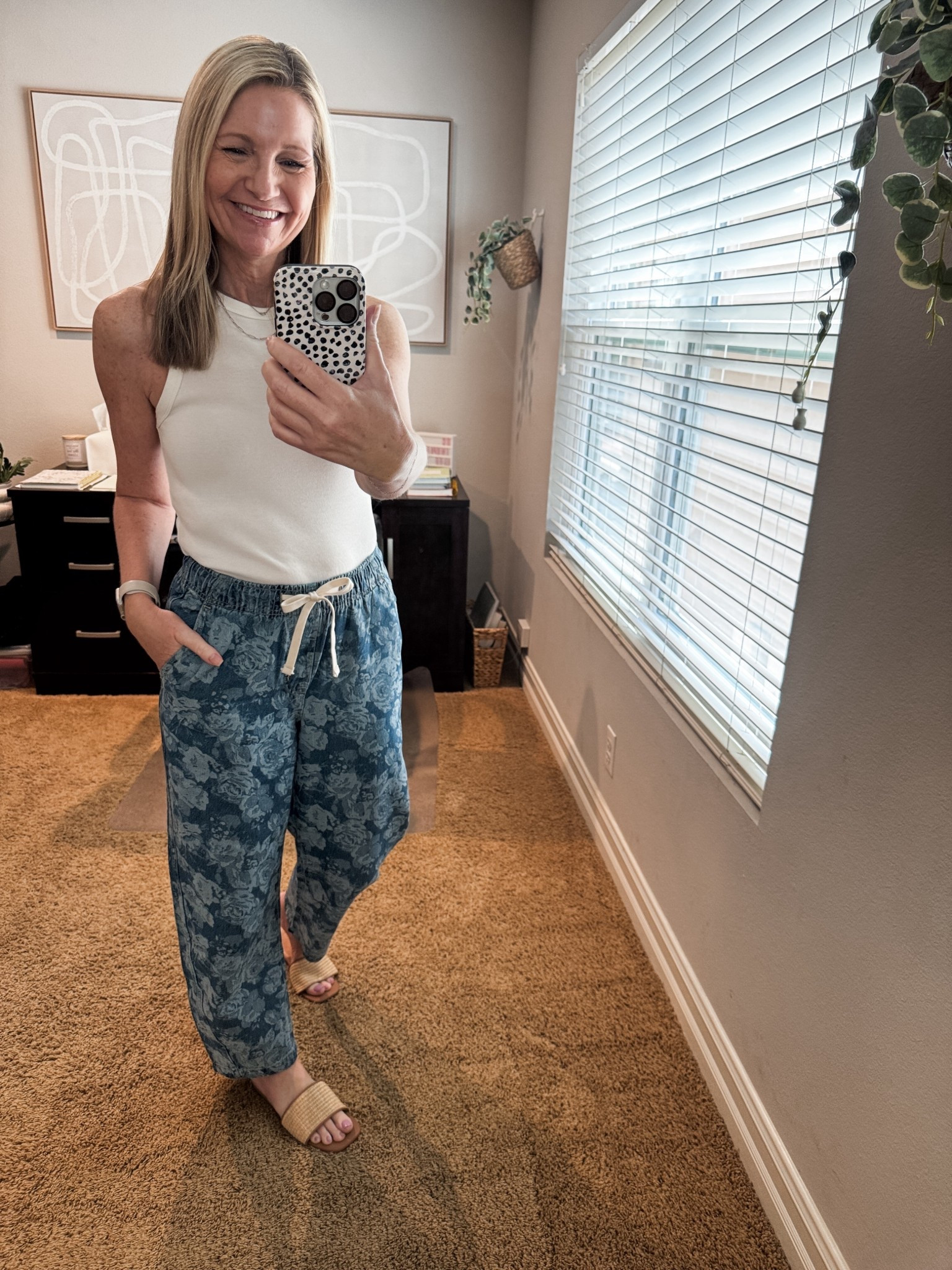 Could not resist these floral drawstring waist barrel jeans from Gap Factory. I sized down to an XS and they are so comfortable. Throw on a denim jacket if it’s not quite tank top weather where you are. 

And speaking of tank tops, this is my favorite Target tank that’s on sale this week for Target Circle Week. 

My sandals are Target and the perfect neutral pair to go with everything. 

#LTKootd #LTKSaleAlert #LTKOver40