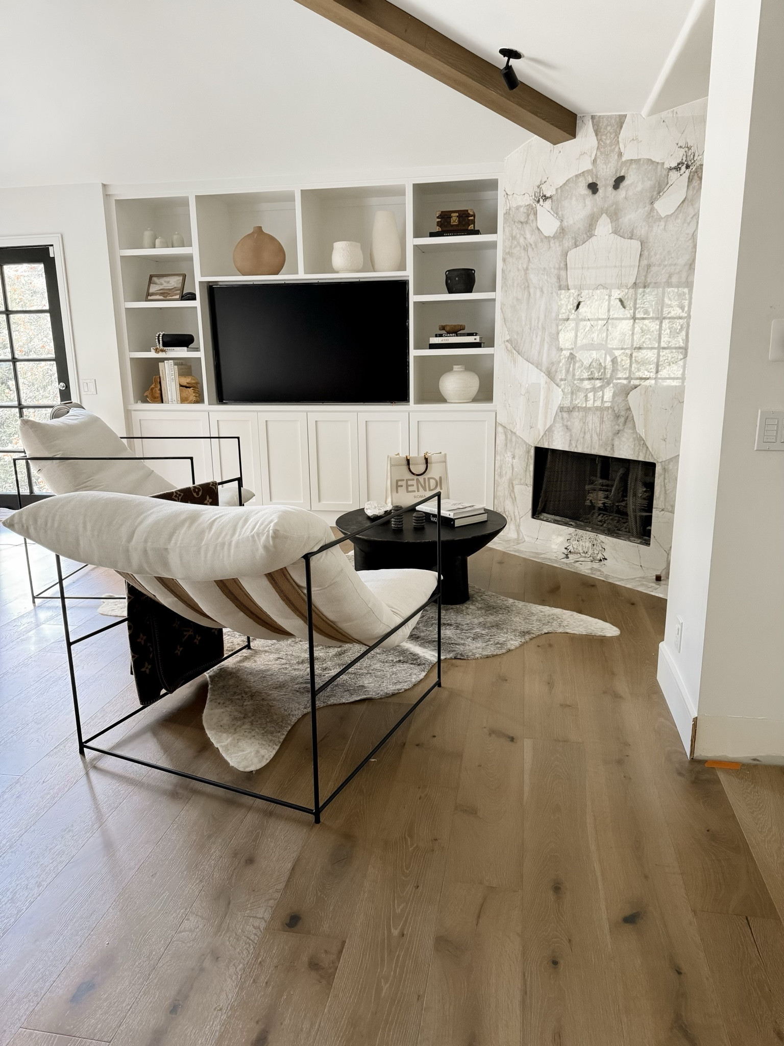 This gorgeous area rug gives this space such a luxe feel… at a much better price than you would expect. 

Amanda’s chairs are from Croft House, but we linked you some similar styles! 

— Kimberly | Team AF 

#LTKhome #LTKSeasonal