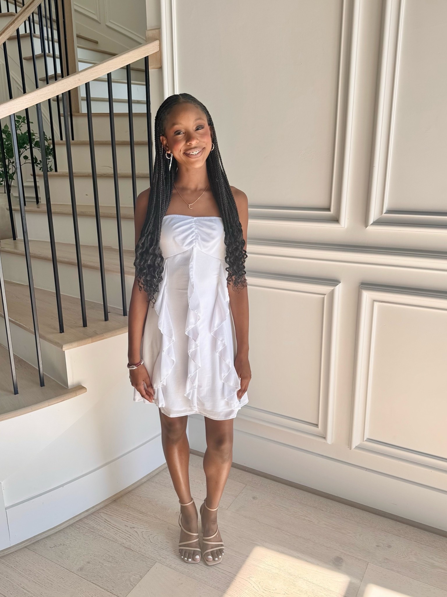 My teenager had her induction for the high school dance team and they had to wear white. This Amazon find for the shoes and dress was great!