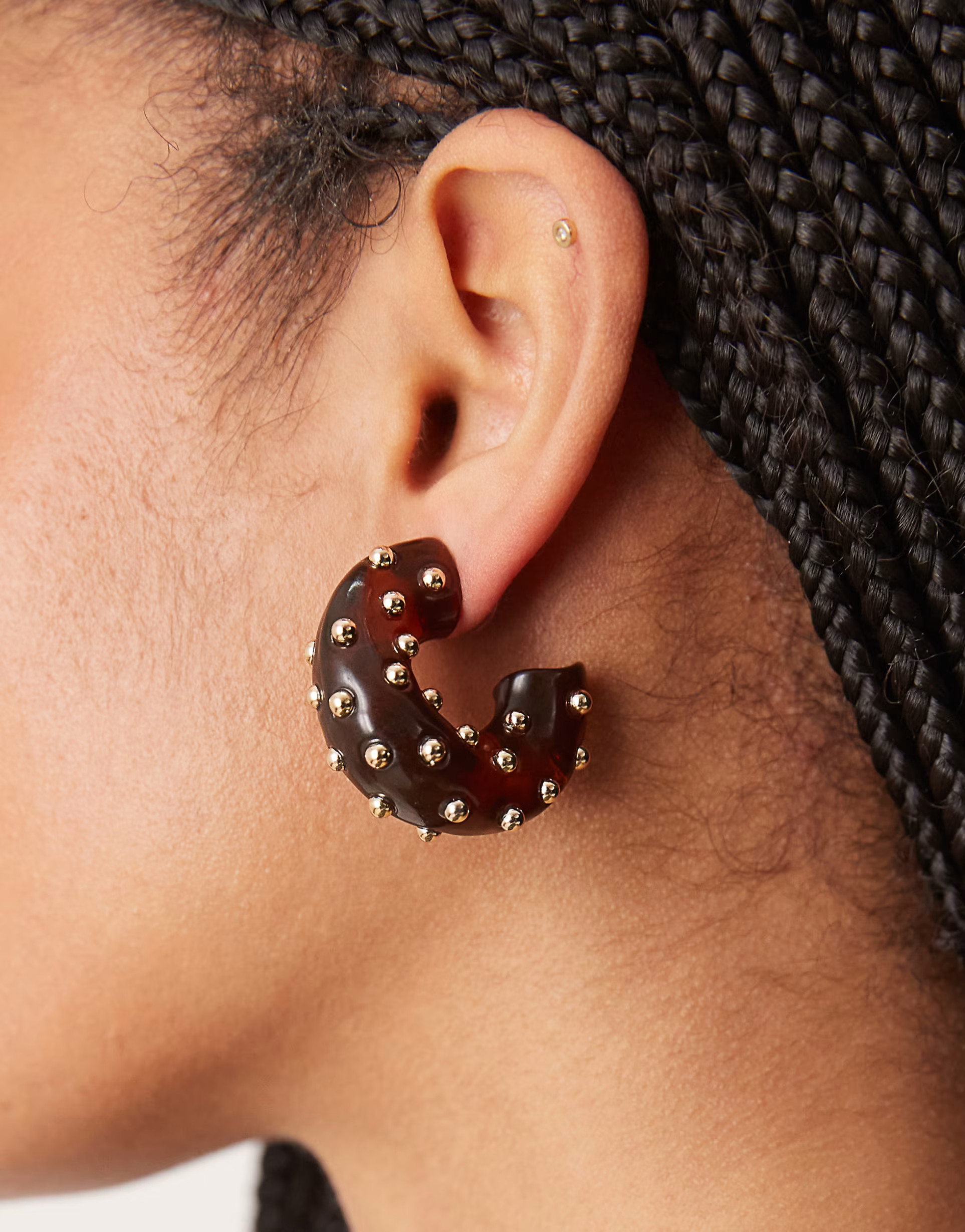 ASOS DESIGN hoop earrings with chunky studded resin hoop detail in brown | ASOS (Global)