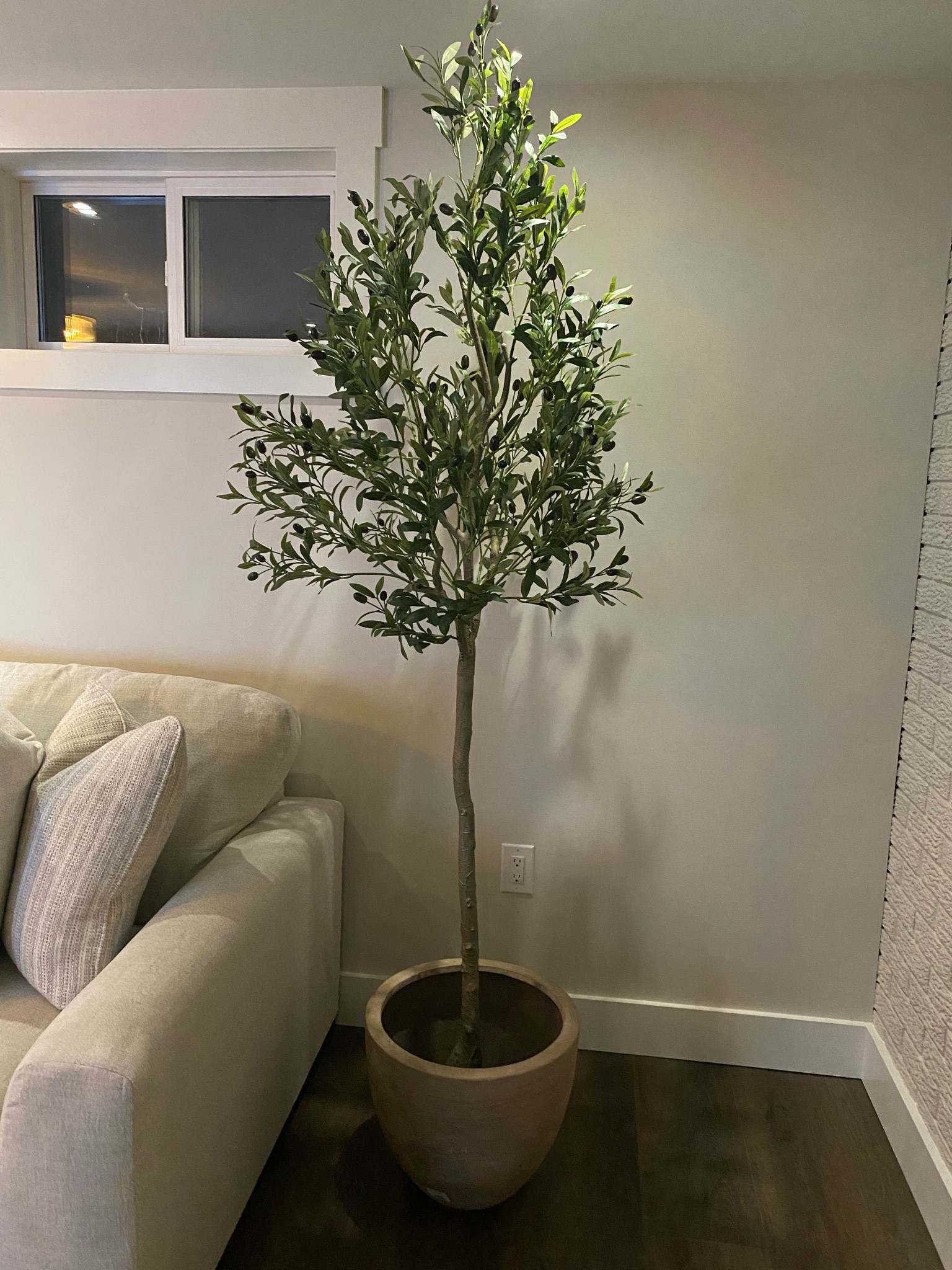 My new favourite faux olive tree! Faux trees, olive tree, indoor tree, planter pot, faux plants, living room decor, family room decor, Amazon home decor, target home decor, crate and barrel, cb2 home, west elm decor, pottery barn, home decor trends, organic modern, home trends, neutral home, minimalist home decor 

#LTKhome #LTKunder100 #LTKstyletip