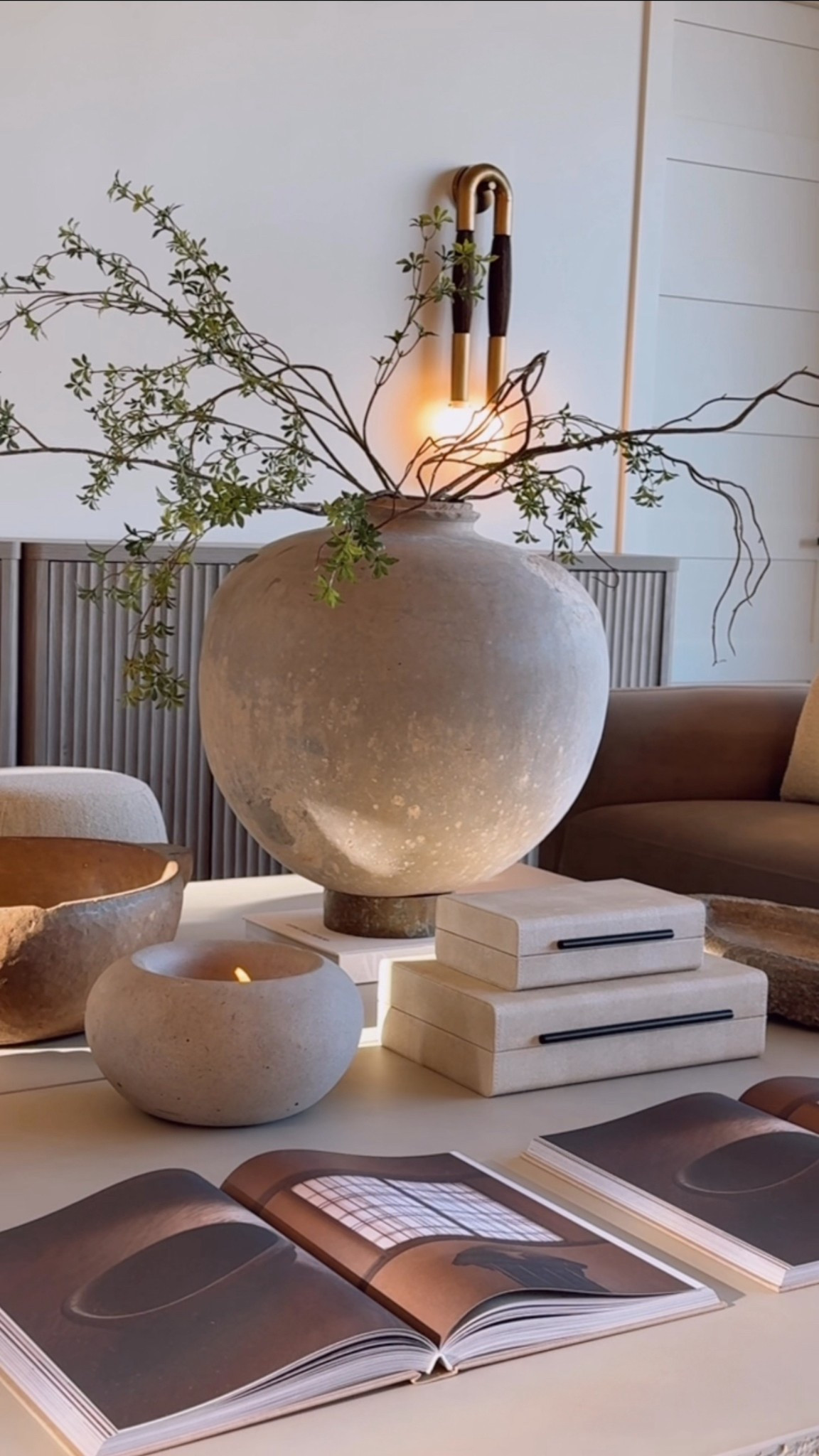 This oversized vase is such a statement piece. I love how the natural texture and simple greenery instantly ground the room.🤍

#modernorganic #neutralstyle #vasearrangement #warmdecor #interiordesigninspo

#LTKHome #LTKStyleTip