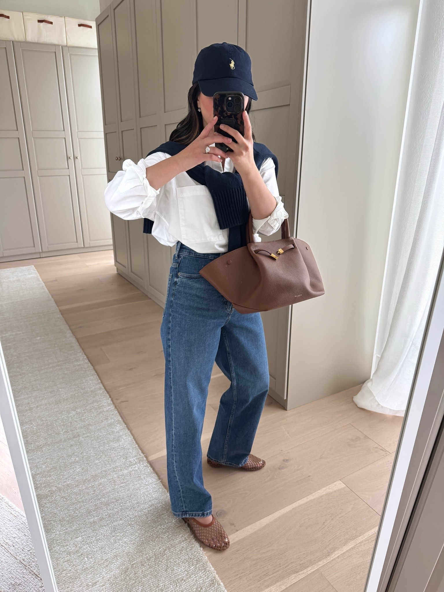 If you're looking for one pair of straight-leg jeans this fall, I'd start here. Petite-friendly, a true high rise, and they make your legs look so long.

AYR Deep end shirt xs 
Everlane Way High jeans 25 
Everlane cotton sweater xs 
Staud flats 35 
Polo Ralph Lauren hat 
Electric Picks earrings 
Dorsey James 15” 
DeMellier bag medium

fall outfits, fall style, petite style

#LTKootd #LTKmomlife #LTKPetite