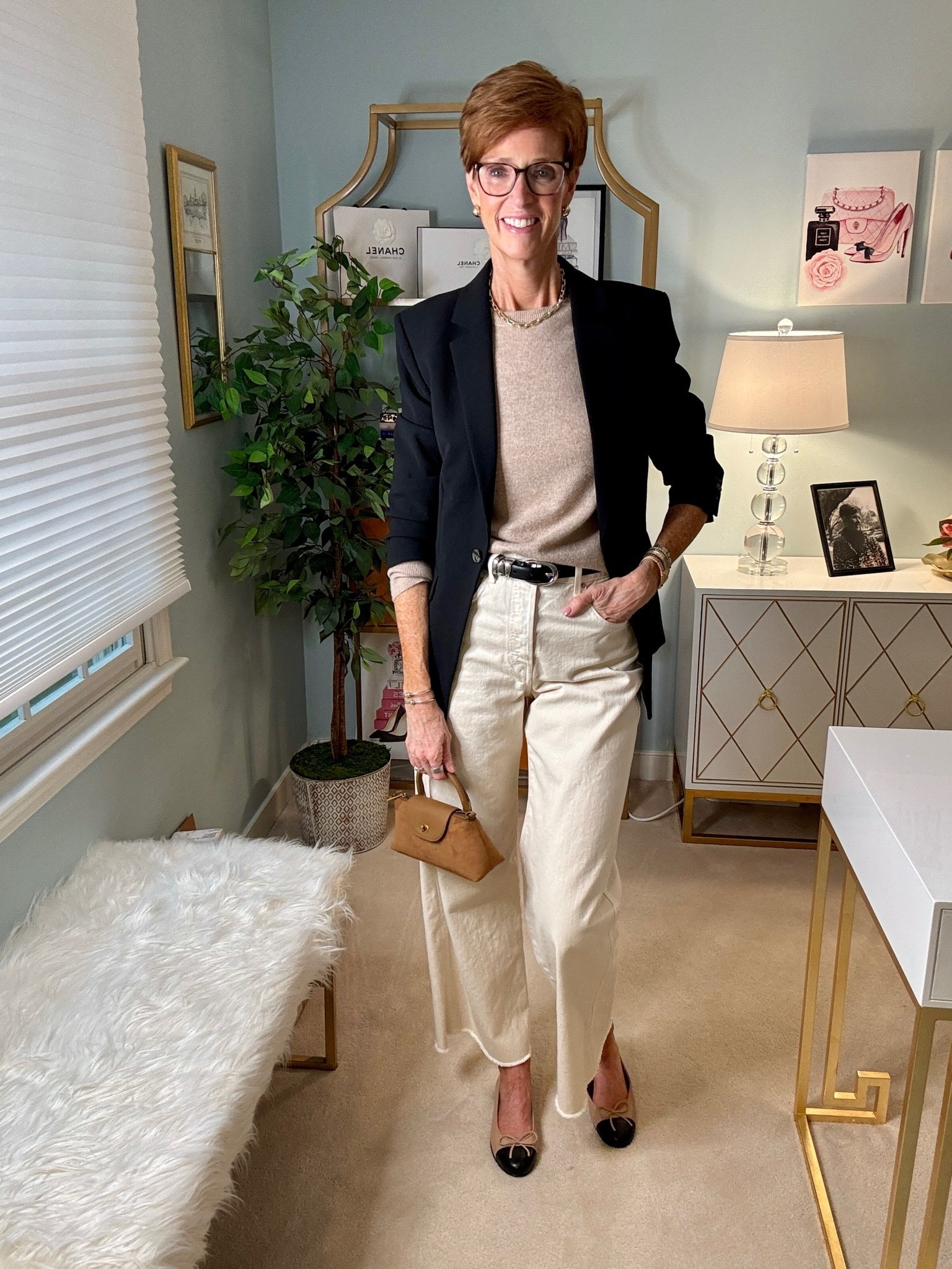 One of my favorite ways to make a classic black blazer feel more relaxed is to pair it with softer, lighter pieces. A beige cashmere crewneck, cream wide-leg jeans and cap-toe shoes give you the polish of a blazer without making the outfit feel too corporate or dressed up.

And this is exactly why I think a black blazer earns its place in a fall wardrobe. Wear it with trousers, absolutely—but then try it with jeans, cashmere, tees and other everyday pieces you already own.

Save this fall blazer outfit formula for the next time you’re staring at your closet, and send it to a friend who owns a black blazer but never knows what to do with it.

Would you wear this for work, weekend—or both?

#LTKootd #LTKOver40 #LTKTall