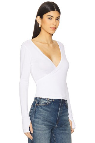 Aziel Long Sleeve Cross Front Top in White | Revolve Clothing (Global)