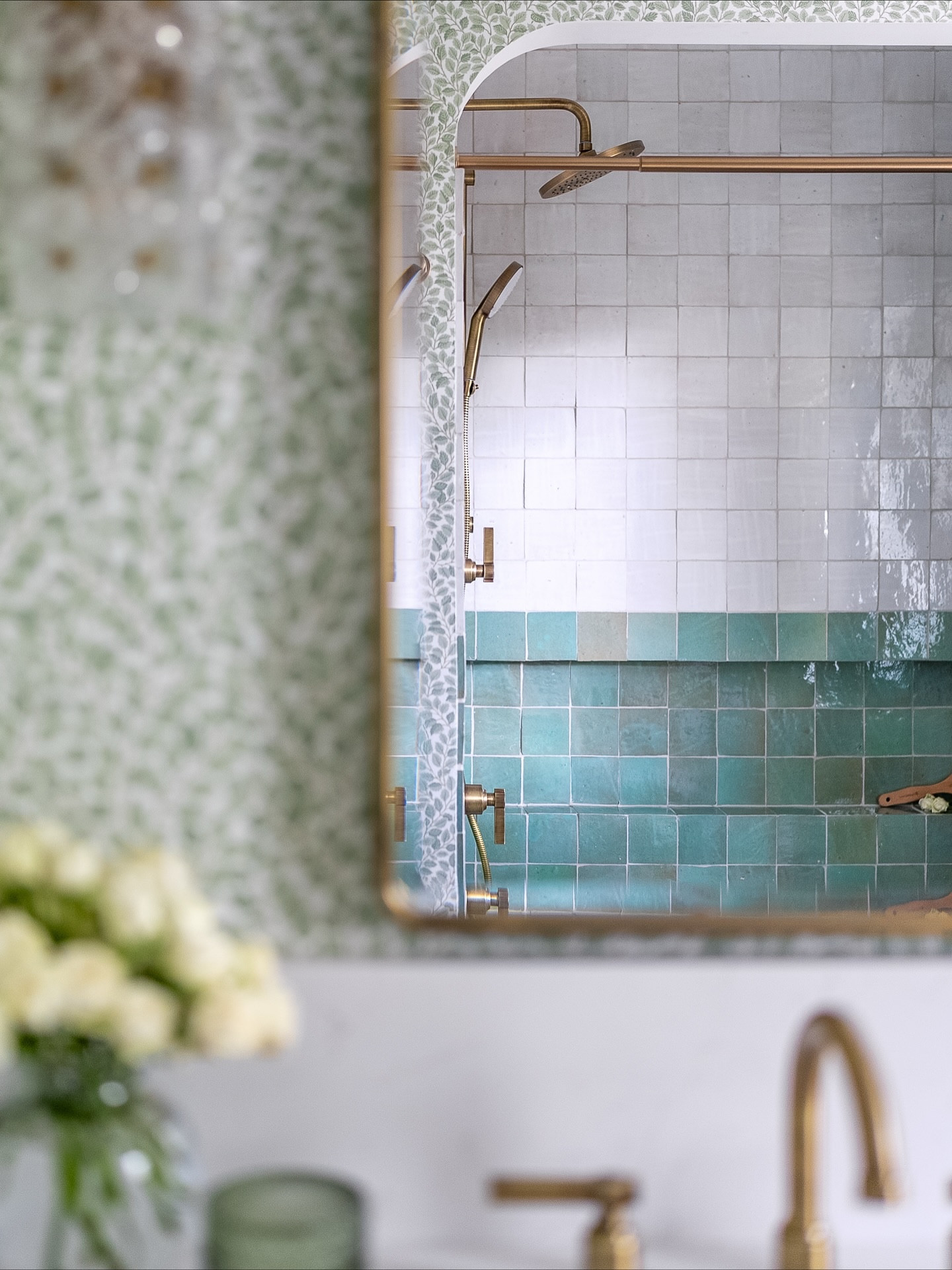 This one is special. A project where trust met creativity with full grace from the homeowner to take control and dive deep into the details.

Arches above the alcove tub, two-tone handmade tile, botanical wallpaper, a radius vanity backsplash, playful lighting, and aged brass that glows just right.

And that’s only the beginning. 

GC: @akn_interiors 
Photos: @khhomephotos