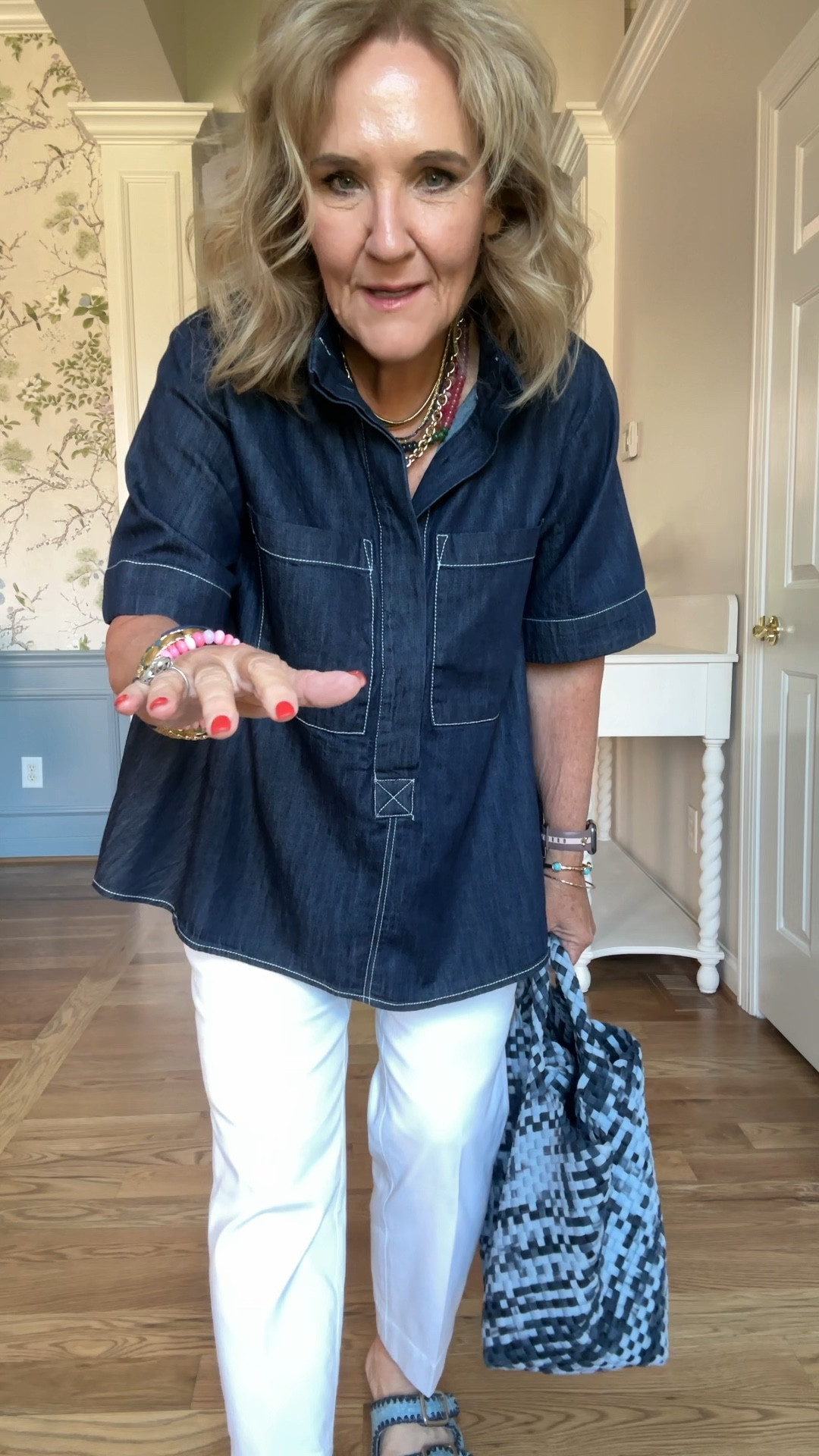 OOTD for work from home. I get dressed for me!
Anthropologie denim top is restocking and accepting orders for shipment in September. Place your order so you get one. I’m wearing a small, so sized down. 
Spanx stretch twill in the slim straight style. I’m wearing a medium petite, if petite you might consider sizing up because these are pretty fitted. 

Went big on my  Allie & Bess jewelry. You can use my 20% off code site wide.NANETTE20 they also have launched their new game day collection with some really cute styles.

My Chico slides are on sale and my  Naghedi bag is sold out on anniversary sale, but I did find it somewhere else

#LTKFindsUnder100 #LTKOver40 #LTKWorkwear