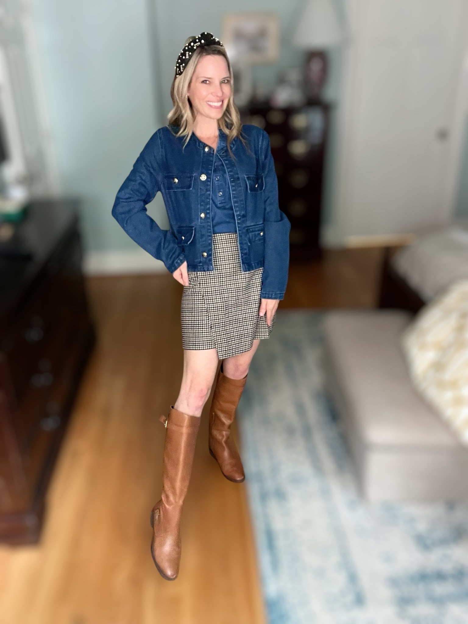 Classic fall layers never go out of style 🍂 I paired this ruffle-collar chambray top with a wrap-front mini skirt for a timeless preppy look. To pull it all together, I added a denim jacket, pearl knotted headband, and my go-to leather riding boots—a chic mix of casual and polished. ✨ Gold accents from Abbott Lyon jewelry and Ahava tennis bracelet add the perfect finishing touch. This look is ideal for transitioning into fall, whether you’re heading to brunch, running errands, or styling for the office!

🛍️ Shop the full outfit below and recreate this effortless classic style:
	•	Old Navy ruffle-collar top
	•	Old Navy wrap-front mini skirt
	•	Amazon denim jacket
	•	Sam Edelman riding boots
	•	Pearl beaded headband
	•	Abbott Lyon watch & necklace
	•	Ahava tennis bracelet & custom gold jewelry

🍁 Preppy, polished, and wearable all season long!

⸻

 fall outfit, fall fashion, classic fall style, preppy fall look, Old Navy fall outfits, Sam Edelman riding boots, denim jacket outfit, mini skirt fall outfit, Abbott Lyon jewelry, Ahava tennis bracelet, affordable fall fashion, chic fall style


#LTKOver40 #LTKFindsUnder100 #LTKFindsUnder50