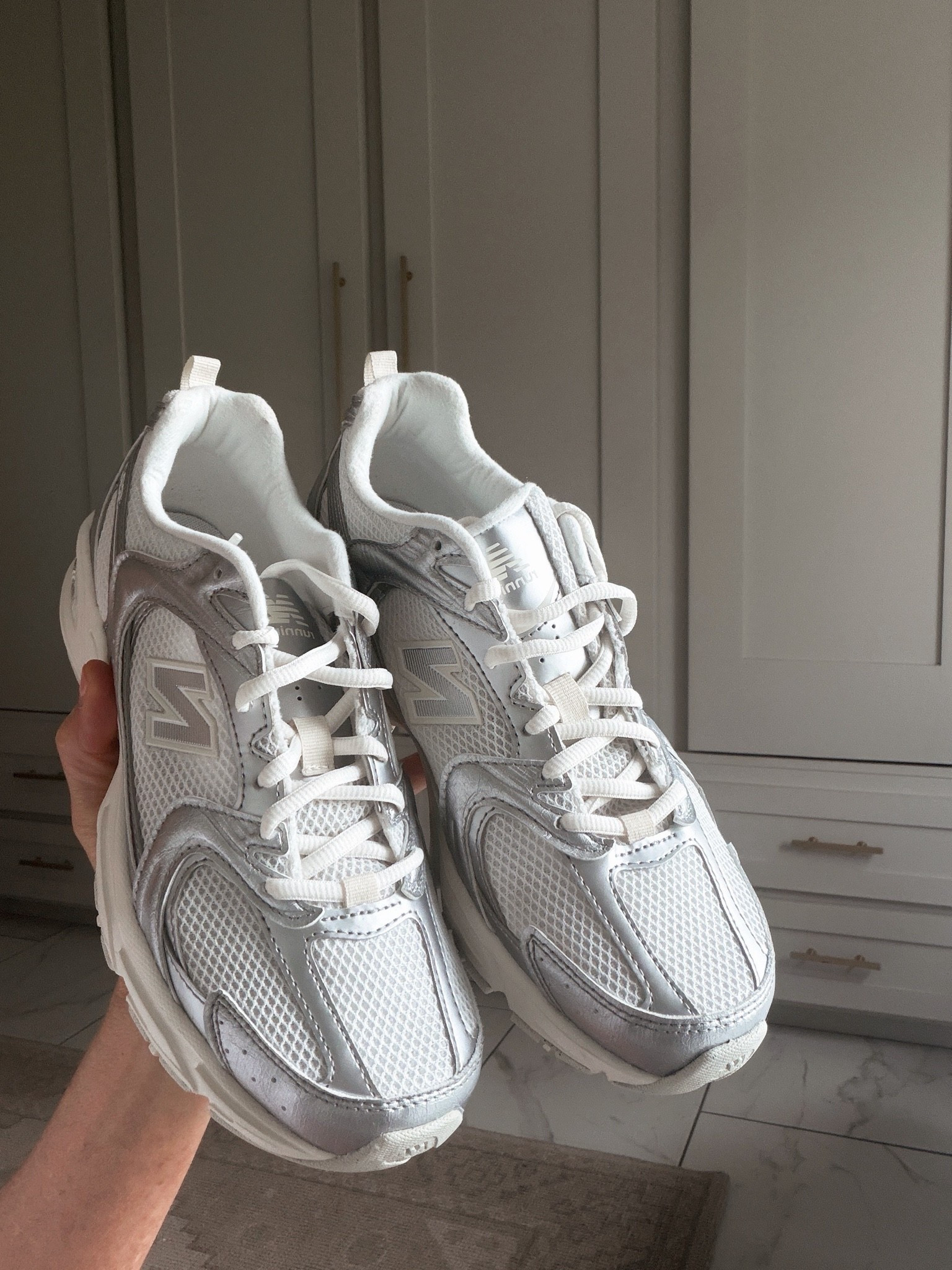 Silver metallic reflection. True to size 
New balance sneakers

#LTKOver40 #LTKActive