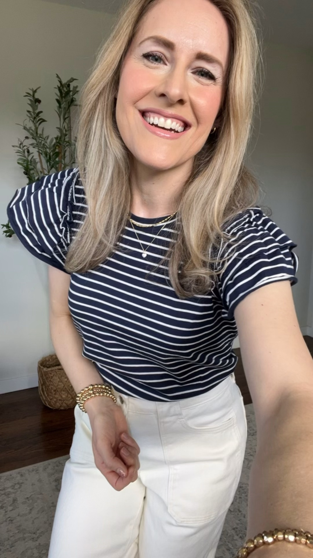 Great little $12.98 cotton crewneck top with flutter sleeve at Walmart. Several colors. Fits true to size. Dress up or down. #walmartfashion 

#LTKOver40