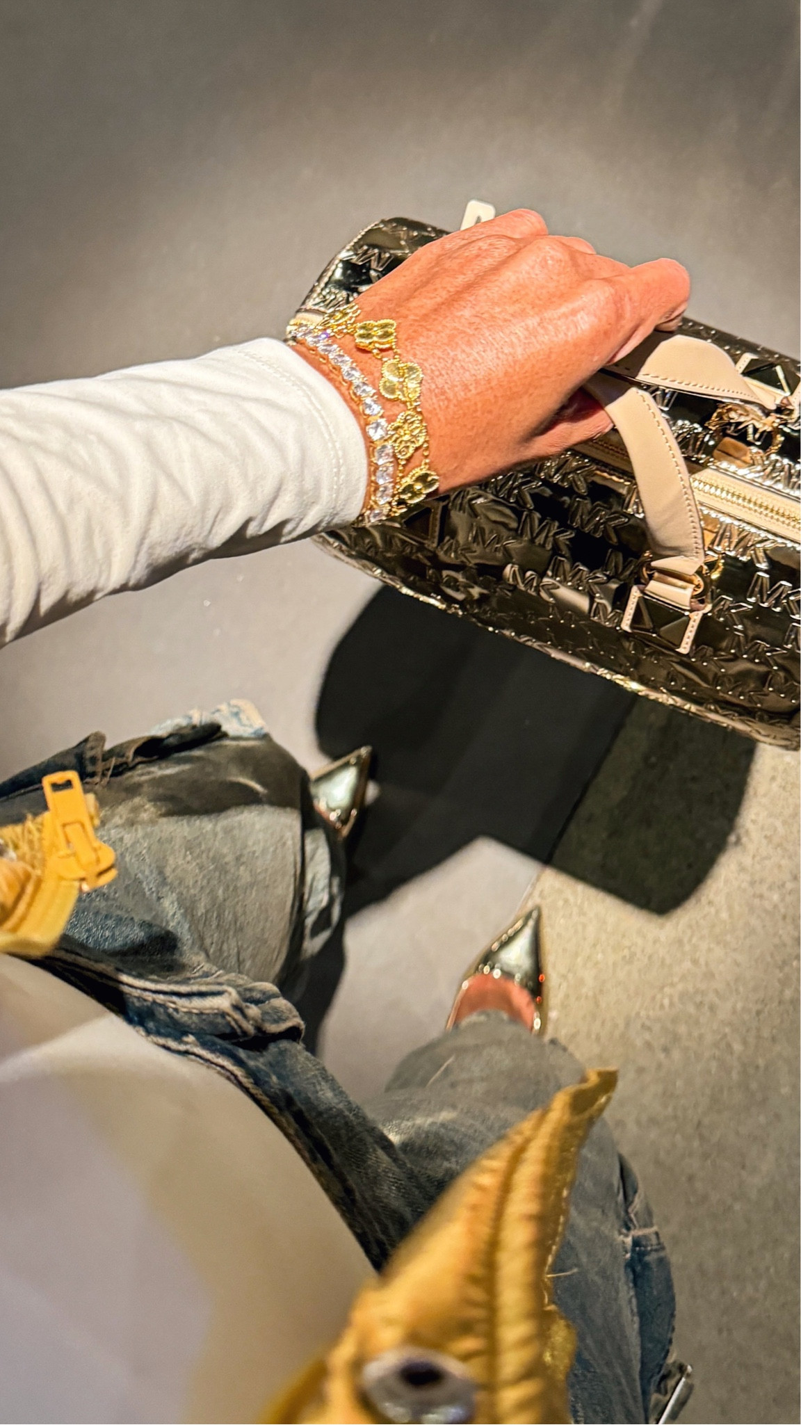 My gold Michael Kors Grayson medium satchel bag is my current favorite purse, and it’s on sale at a few places for $179 🙌🏾🤑.

It can fit a ton of stuff inside, and because it’s metallic gold it easily elevates any casual outfit.

I’ll be styling this bag with a lot of my winter outfits this season! ❄️✨.

#LTKitbag #LTKsalealert