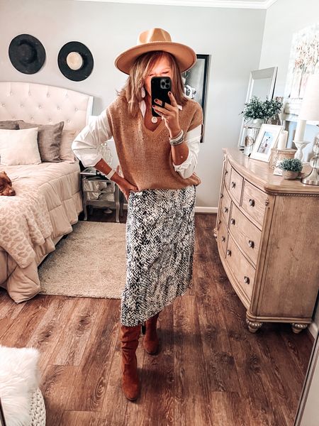 Latest Walmart finds that I’m loving 🥰 midi Skirt styled with white button down shirt by Time and Tru, mocha vest by Time and Tru with cognac boots. 

Fall outfits, Walmart fashion, Walmart outfits, Walmart finds, Walmart boots, skirts, workwear, work wear outfit, business casual outfit, fashion over 40

#LTKunder50 #LTKsalealert #LTKworkwear