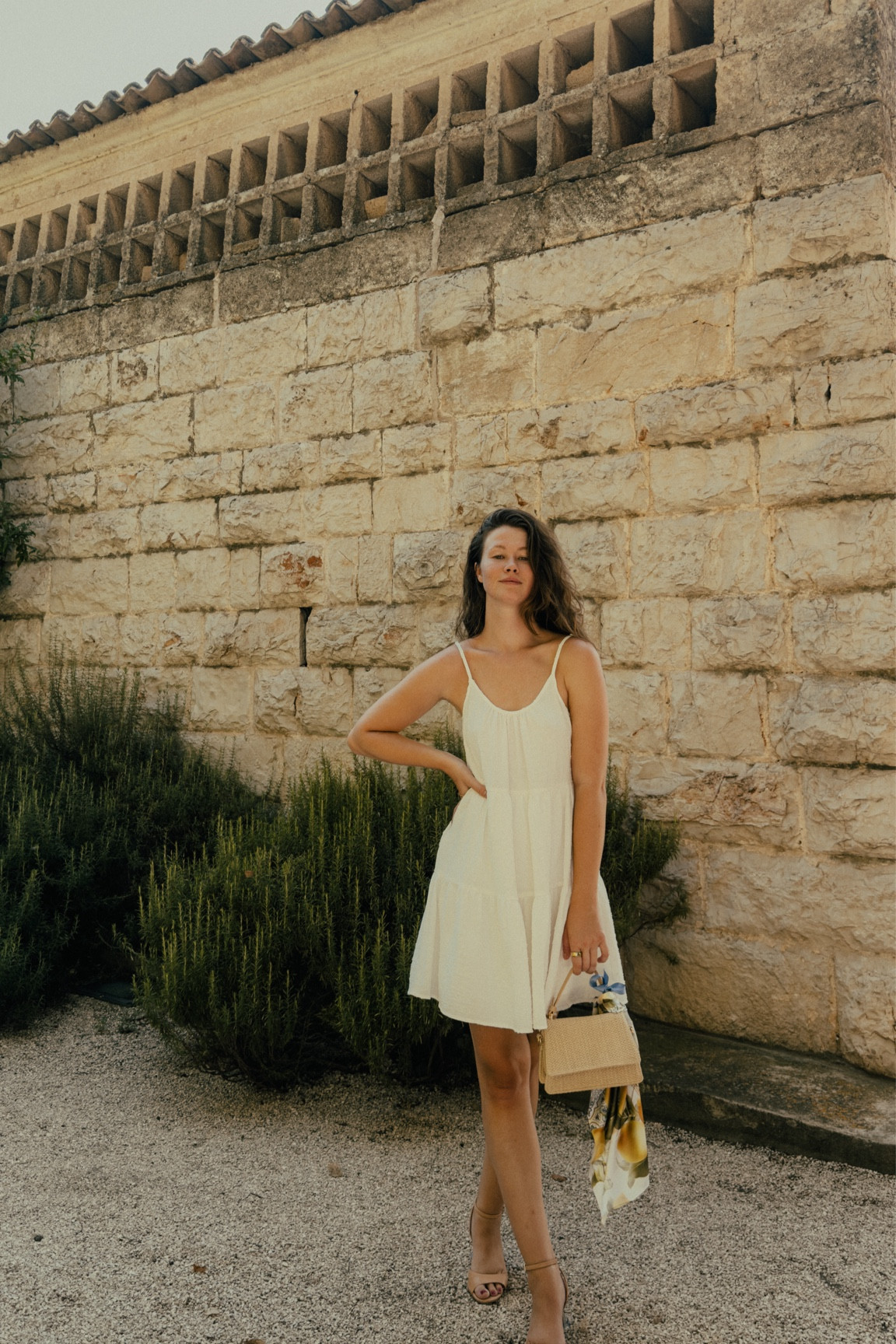 Casual day outfit! 

Gretchen wears a white mini dress in size XS, nude sandals in size 8.5/39, and a straw handbag. Silk scarf around the handle for a cute touch! 

#LTKStyleTip #LTKFindsUnder100 #LTKTravel