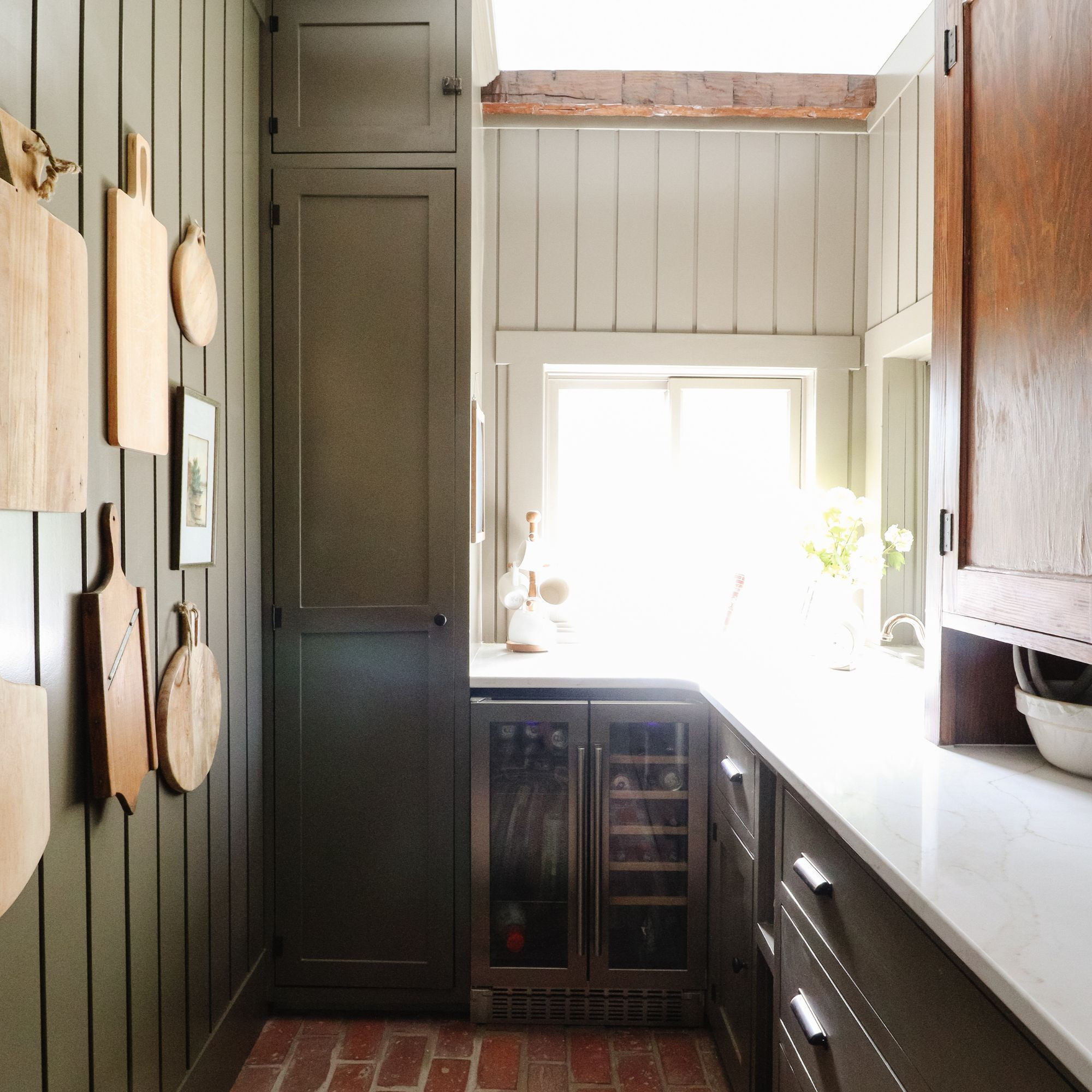 One of my favorite transformations 🤎 This pantry used to be completely wasted space — now it’s full of warmth, storage, and character. The brick floors, custom cabinets, and layered textures made it feel like it’s always been here. I linked similar cabinet hardware and cutting boards so you can get the look! 

 #LTKHome