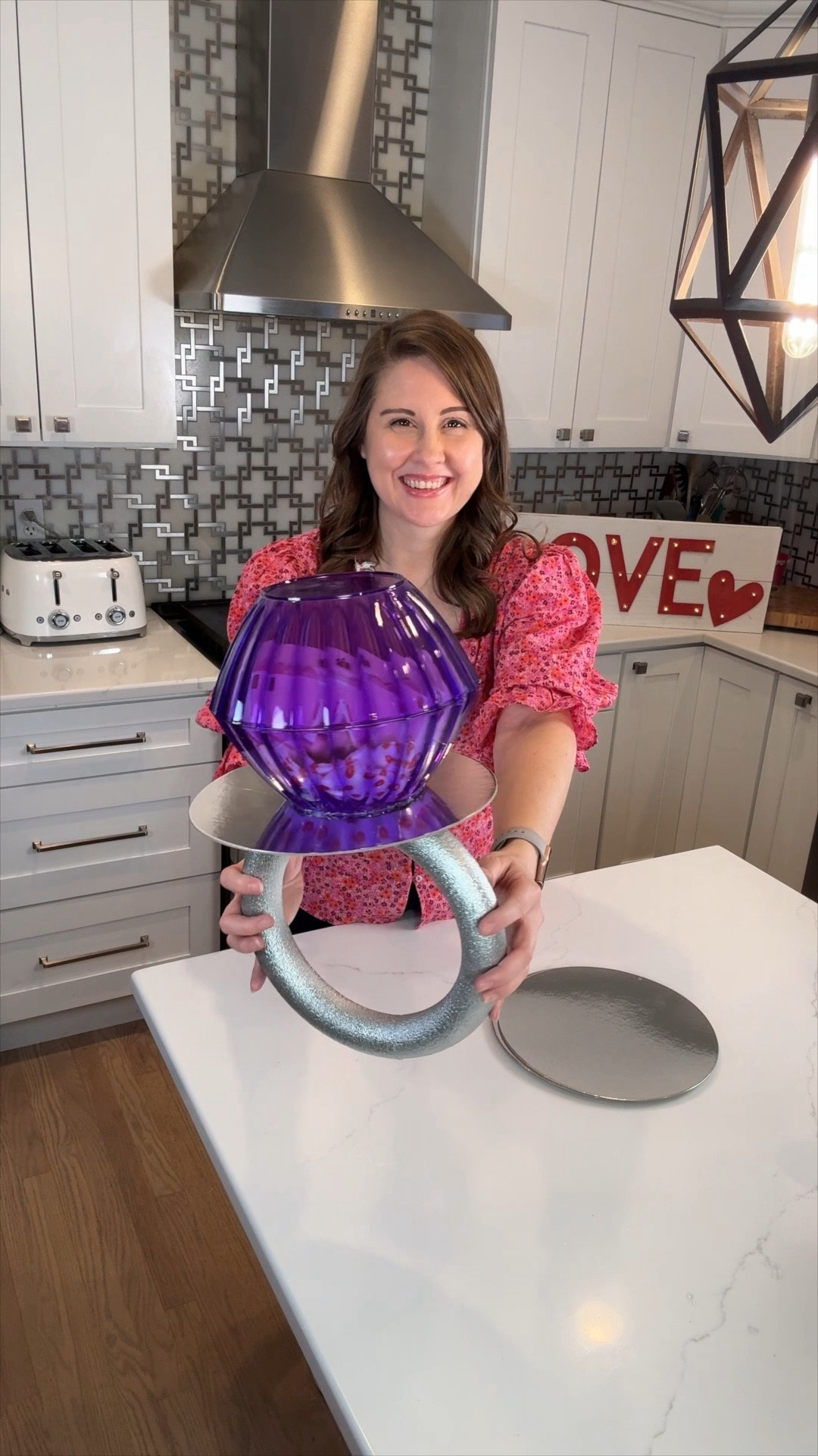 Wrap up some Valentine’s Day surprises with a giant DIY Ring Pop.  This would make really fun party decor too!  This one is inexpensive + easy.  You can find the bowls at the dollar store along with the floral ring, but I’ll link an alternate just in case. ❤️ #valentinesdaydiy #valentinesdayparty #valentinesdaygifts

#LTKparties #LTKfamily #LTKSeasonal