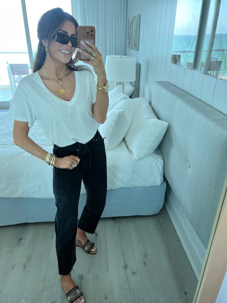 Wearing size 1 in shirt, size 24 in jeans. 
Casual outfit ideas, black denim, white t-shirt, Dior dupe sandals, le specs sunglasses, gold jewelry, vacation outfits, slide sandals, emily Ann Gemma

#LTKshoecrush #LTKstyletip #LTKSeasonal