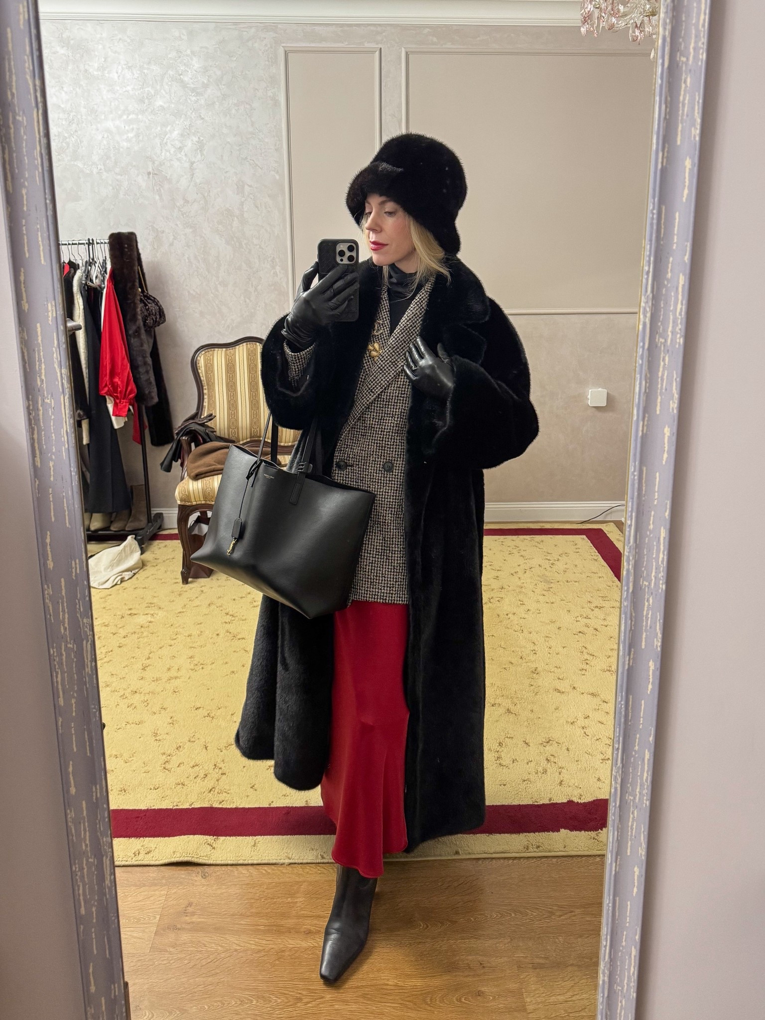 Holiday work wear, winter office look, vintage fur coat, fur bucket hat, red satin skirt, Saint Laurent tote bag, black leather gloves, black and red holiday outfit 

#LTKHoliday #LTKWorkwear #LTKFindsUnder100