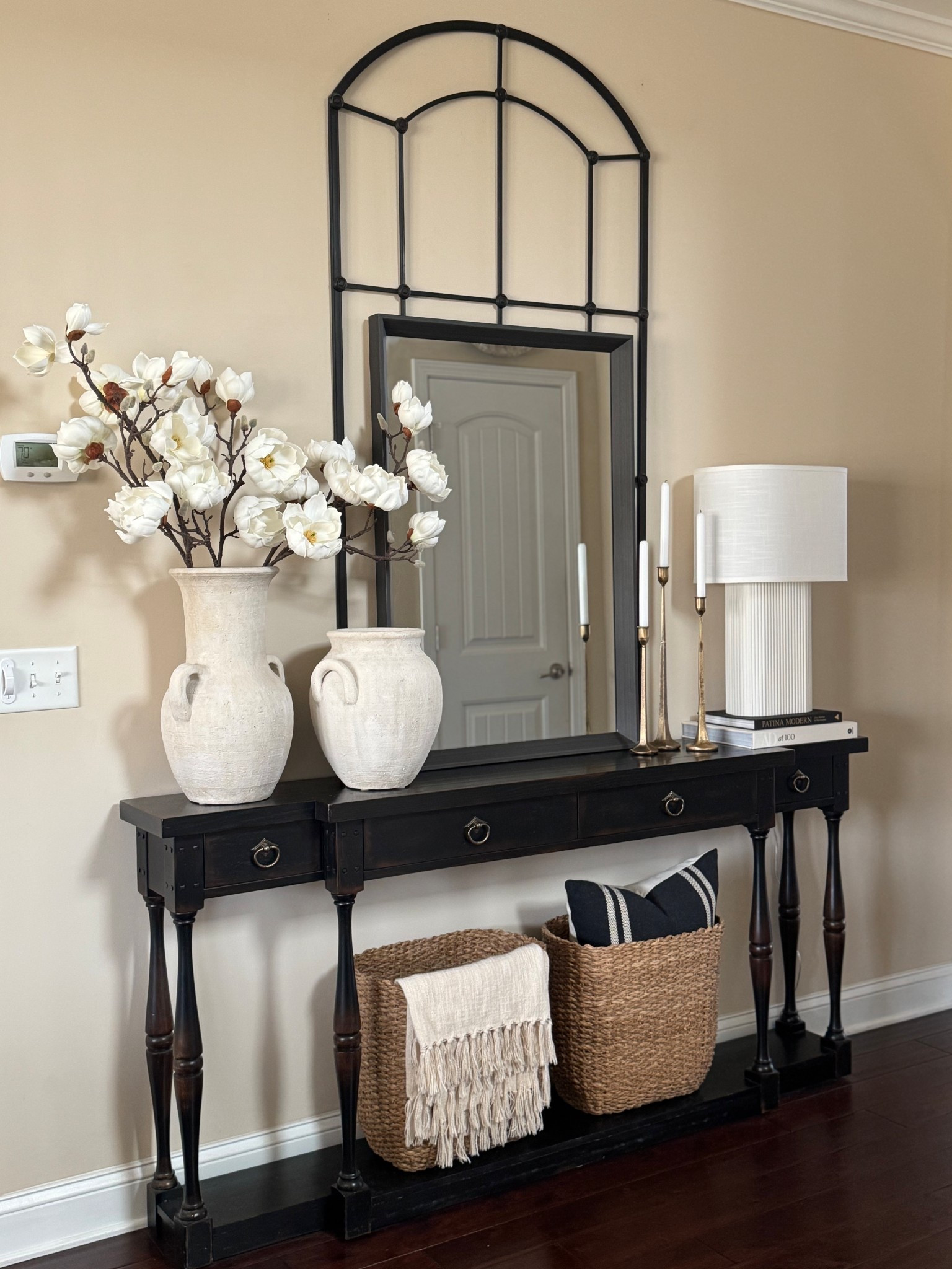 An entryway reset with flowering blooms and full of contrast. Nothing overdone. Mixed materials of earthy tones, metallics and soft textures.
#NewYear #Refresh #Entryway #ConsoleTable

#LTKSeasonal #LTKHome