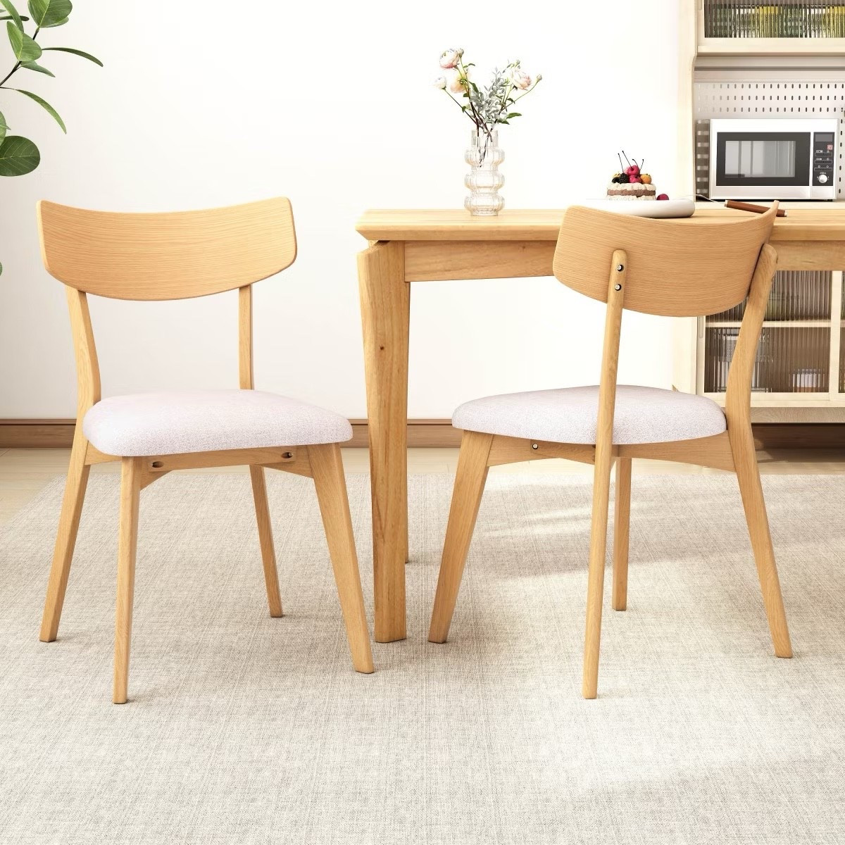 Such a good find 🤍 These wood dining chairs are on sale right now and come in a natural + beige color combo that works with almost any space. Perfect if you’re searching for modern dining chairs, Scandinavian dining chairs, or wood dining chairs with upholstered seat. Love them for a small dining area, apartment dining space, or breakfast nook.

#LTKSaleAlert #LTKHome