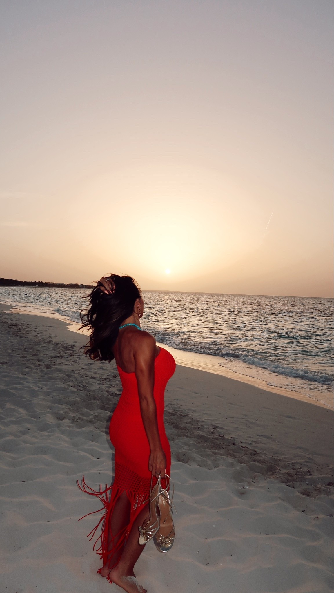 If there’s one thing I’ll never skip on vacation, it’s dinner on the beach.

Barefoot in the sand, salty air, the prettiest sunset, and nowhere to be except soaking it all in. Those are the moments I end up remembering long after the trip is over.

This dress felt made for this night. The fiery coral color with the little pops of turquoise was so pretty against the ocean, and somehow looked even better once the sun started to set.

I already know this is going to be one of those memories I’ll wish I could relive over and over. 🌅

✨ 5’2” • 130 lbs

#BeachVacation #VacationStyle #ResortWear #VacationOutfit #SummerStyle #TurksAndCaicos