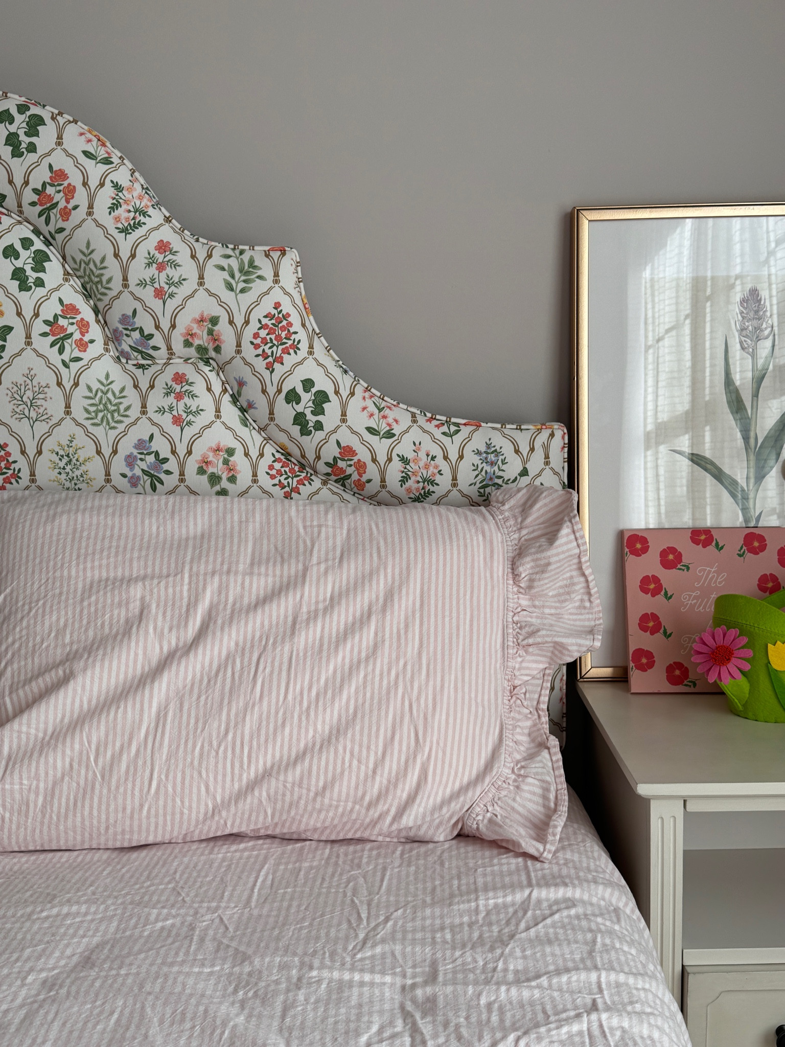 Adorable upholstered headboard & striped ruffle sheets for a little girls room  

#LTKHome