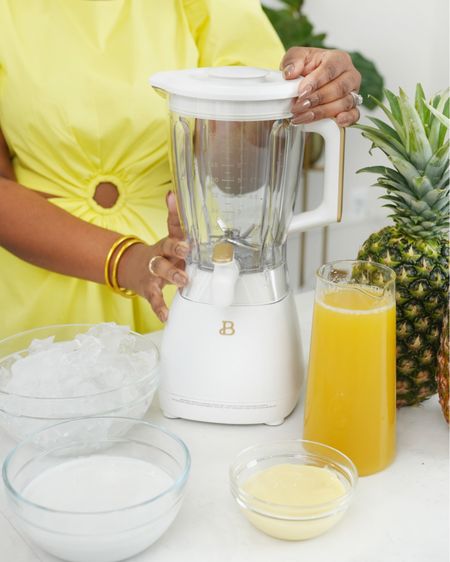 Making Piña Colada using the Beautiful Slush Crush 60 oz 4-Speed Frozen Drink Maker from @walmart #WalmartHome🍹It’s aesthetically pleasing and yet so functional! It even has a dispenser!!! 
#WalmartPartner #WalmartHome  #Walmart  

🥥🍍What you need for 2🍹🍹
* 2 ounces pineapple juice
* 1 ounce fresh pineapple
* 2 ounces cream of coconut
* 1 cup of ice
* 1 fresh lime juice
* Condensed milk to sweeten 
* Pineapple wedge for garnish

🍹Instructions
In a blender, add ice, pineapple juice, fresh pineapple, condensed milk, and cream of coconut.
Blend until smooth.
Pour into desired glass.
Garnish with pineapple wedge.
Serve and enjoy ! 

Easy mocktail recipe, Piña Colada recipe, simple recipe, Walmart home finds , Walmart finds , Beautiful Kitchenware , Beautiful serveware, 

#LTKhome #LTKSeasonal