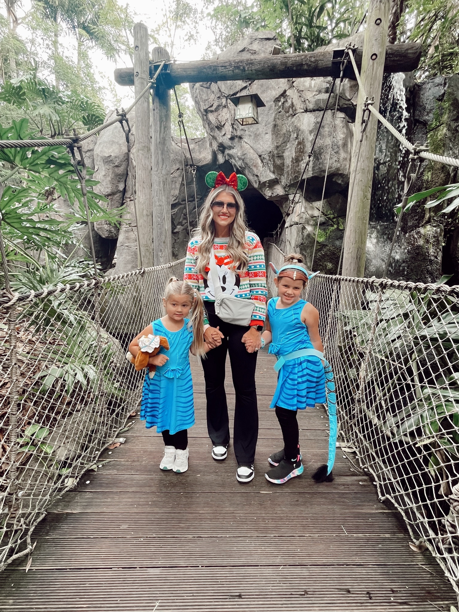 Our Disney outfits today!!! My Minnie Mouse Christmas sweater is 6 years old from Disney so I can’t link it - sorry! But these flare leggings are MY FAVES!