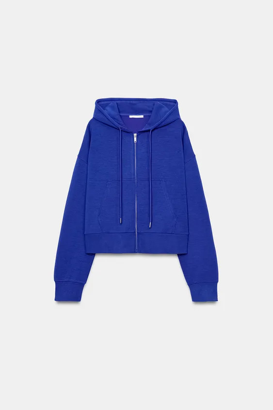 Sweatshirt crafted from a flexible, elastic knit fabric with a compact, plush and opaque finish. ... | Zara UK
