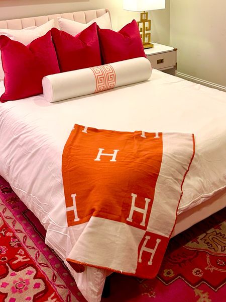 Orange H blanket and hot pink rug 

#LTKfindsunder100 #LTKstyletip #LTKsalealert