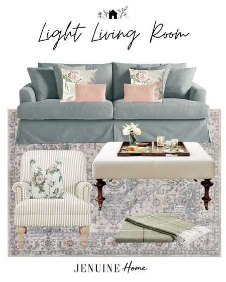 Light living room. Light grey velvet couch. White striped armchair. Tufted coffee table. Tufted ottoman. Green tasseled throw blanket. Neutral traditional rug. Pink lumbar pillow. Floral throw pillow  