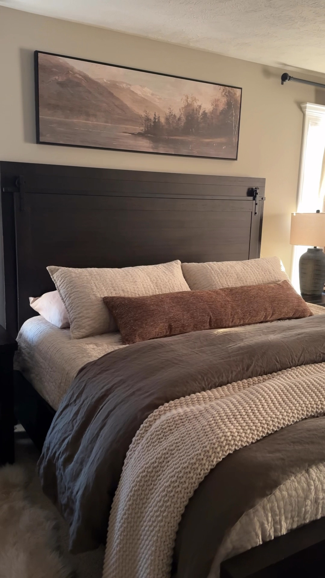 The artwork above our bed! Along with one of my favorite bedding combos! 

#LTKHome #LTKselfcare