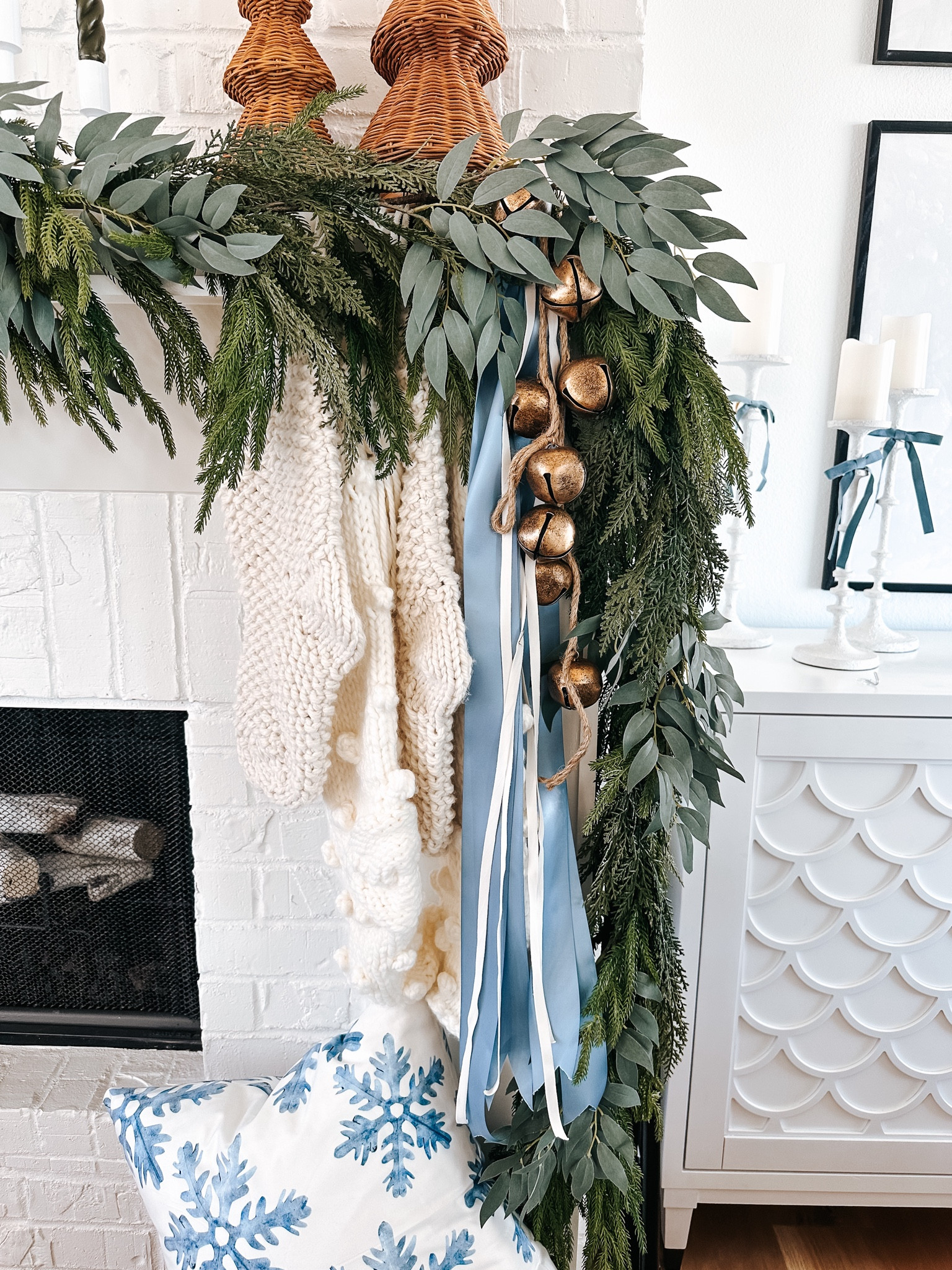 Christmas fireplace mantel includes chunky knit stockings, gold bells, and multiple strands of different ribbon. 

Norfolk pine garland, hearth and hand garland, Target finds, Amazon


#LTKHome #LTKHoliday #LTKSeasonal