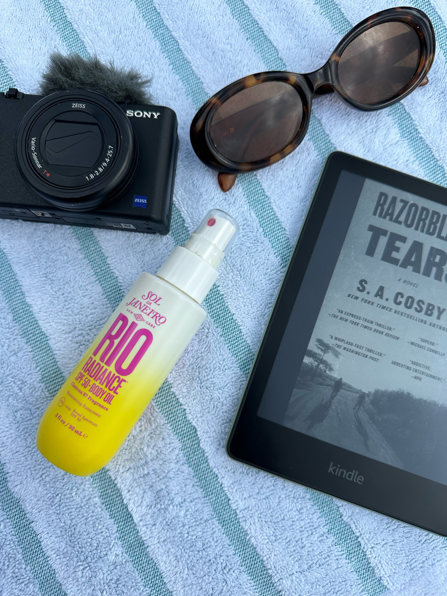 Beach day essentials 🏝️ sunscreen, vlog camera, e reader, retro tortoise oval sunglasses 

#LTKSeasonal #LTKTravel #LTKSwim