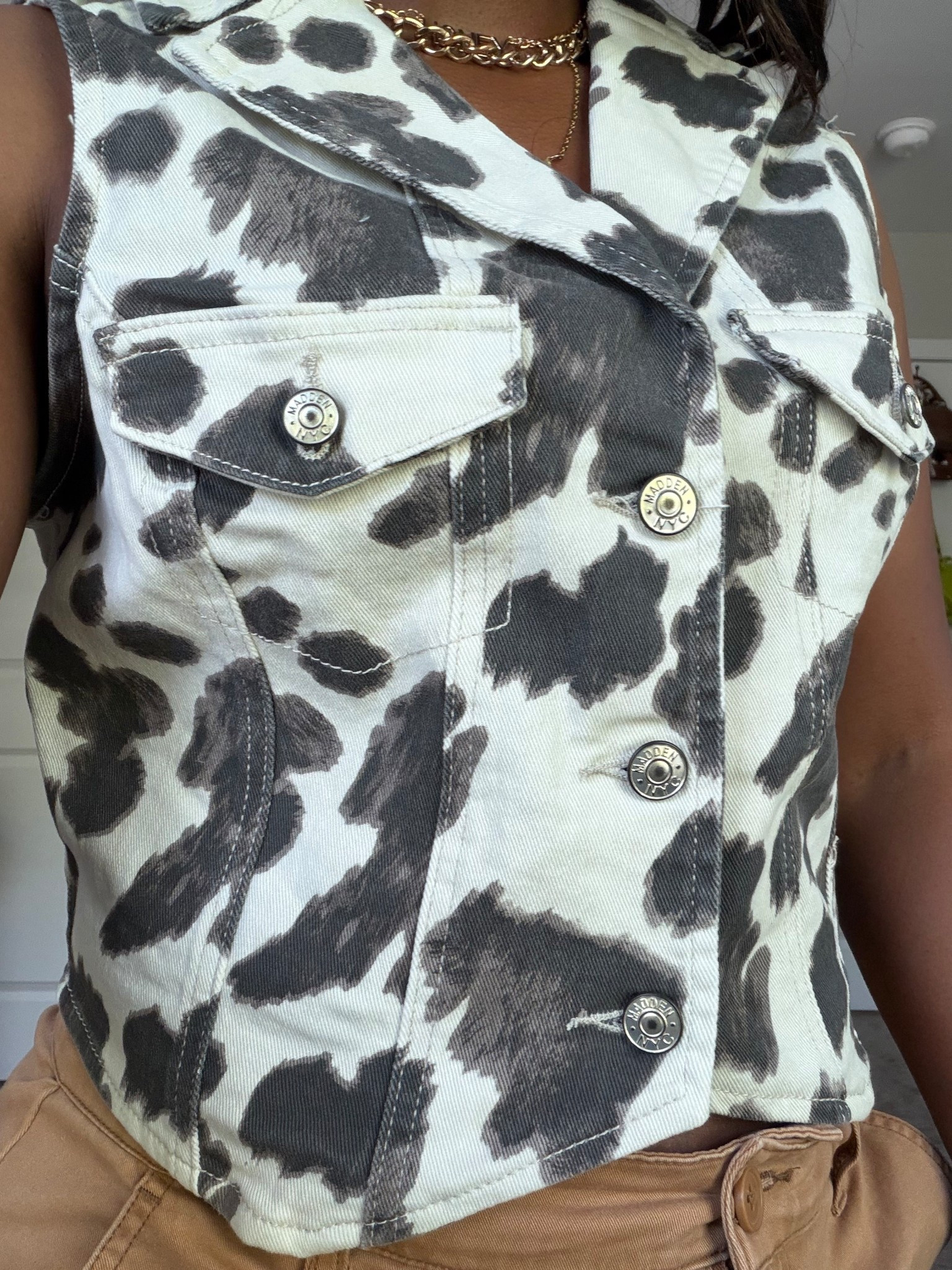 Cow print vest 

#LTKPetite #LTKootd #LTKOver40