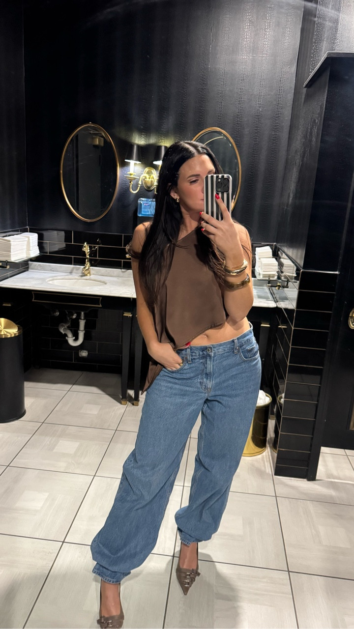 If I wear summer tops perhaps the weather will catch on