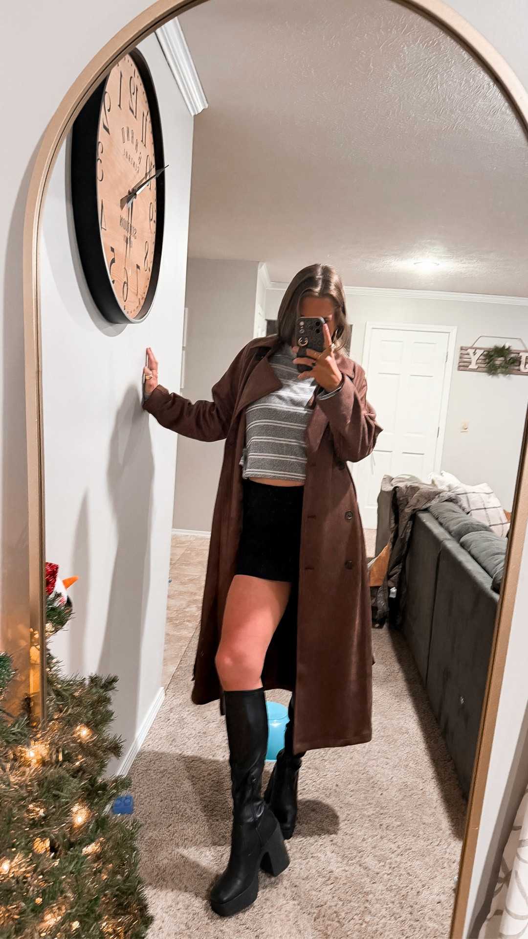 Just a casual but cute dinner vibe I forgot to post ☺️🙌🏼 | fall to winter style | knee high platform boots | black skort | turtleneck | trench coat 
#falltowinter #outfitstyle #looksforless 

#LTKSeasonal #LTKSaleAlert #LTKFindsUnder50