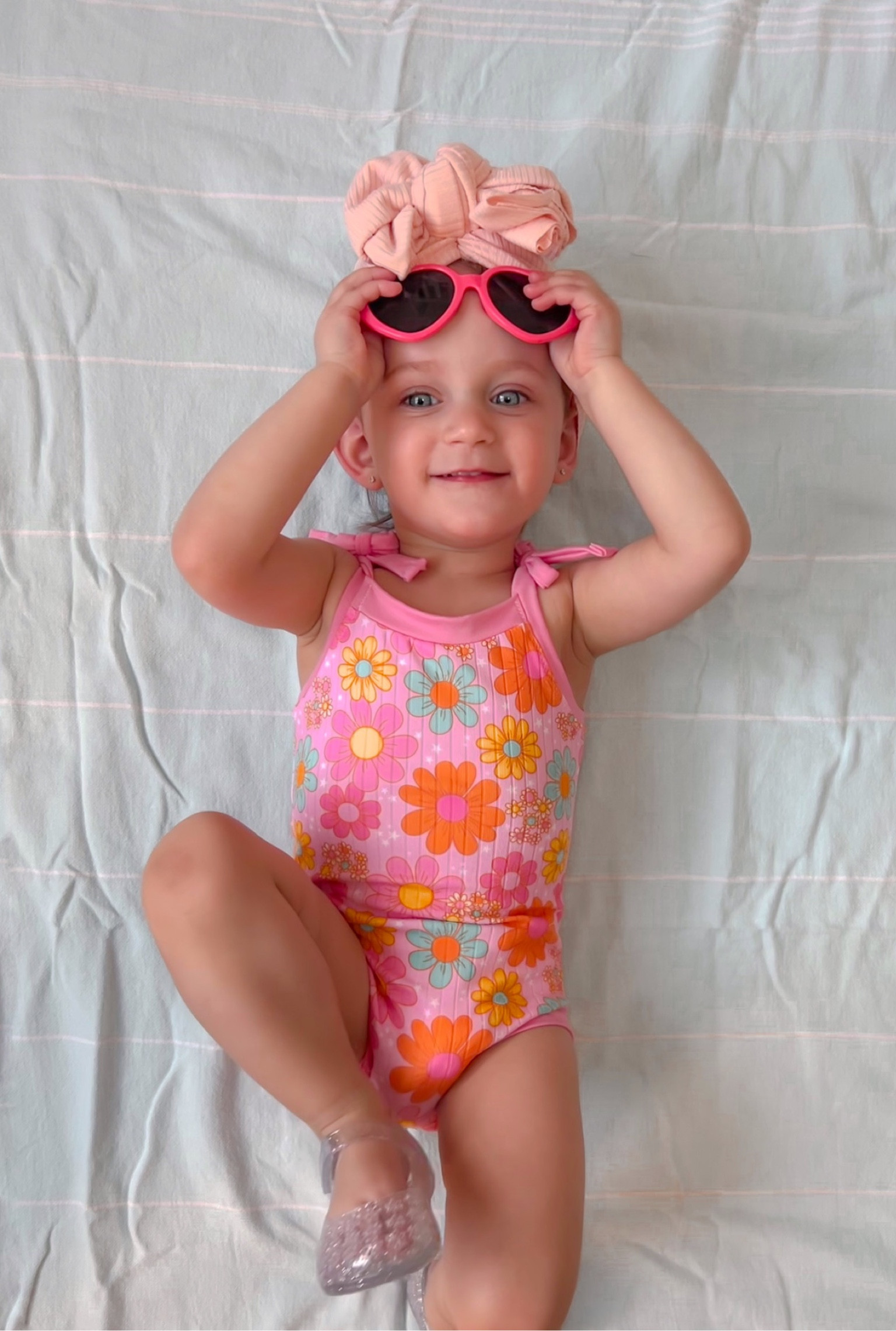 Toddler girl outfit ; toddler spring outfit ; toddler girl pink outfit ; baby girl summer outfit ; vacation outfit ; floral outfit ; tie strap leo ; toddler Barbie vibes ; toddler jelly sandals 

Bow turban @tyednknots - code JULES
Outfit @hellojunedesigns - code Jules10

#LTKkids #LTKbaby #LTKfindsunder50