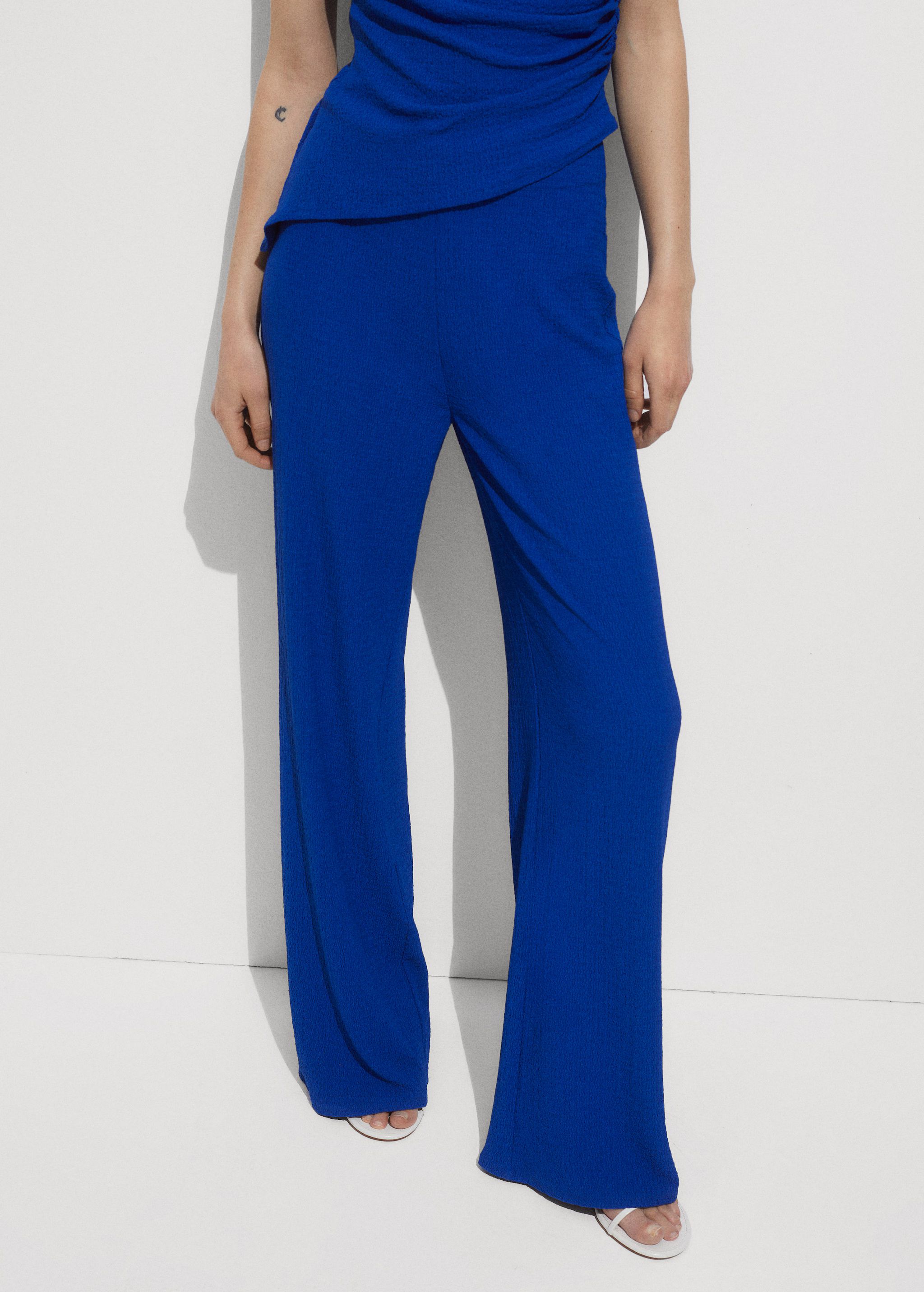 Flowy straight-fit trousers - Woman | MANGO United Kingdom | MANGO (UK)