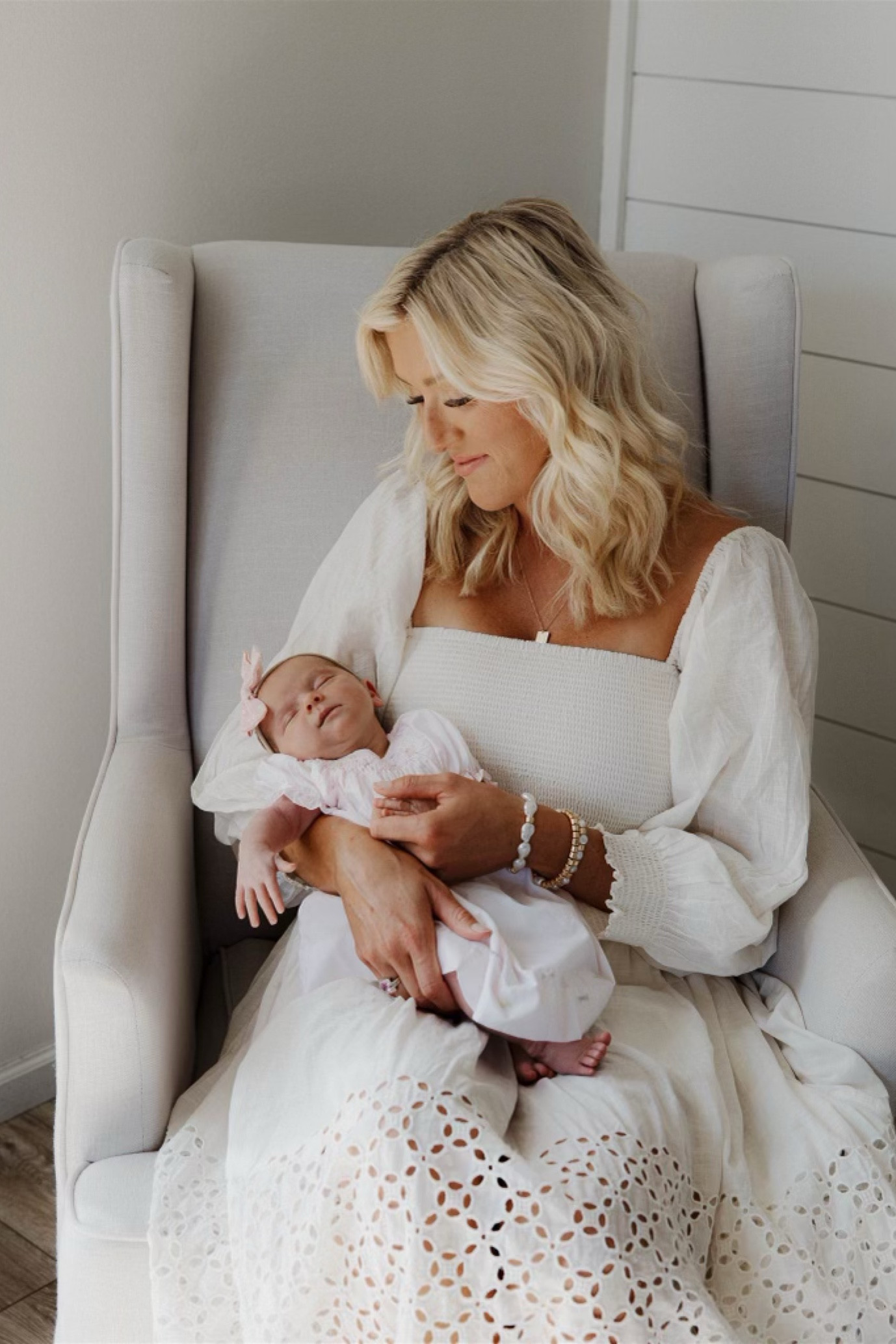 Summer Dress with Free People. Wearing a size small in this beautiful eyelet detail dress that was perfect for our newborn, in home, family session. The details are stunning and this dress snatched me in in all the right places while leaving everything else looking airy and romantic. 

#LTKSummerSales #LTKStyleTip #LTKBaby