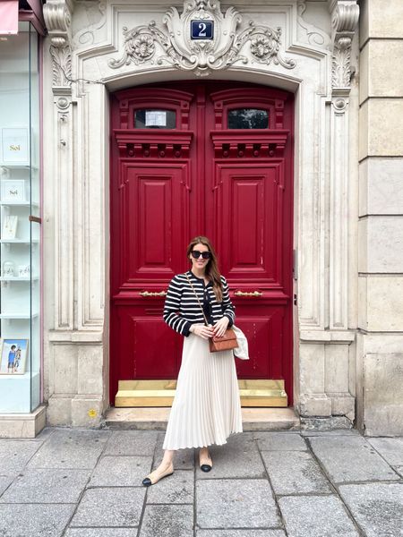 Next time I come to Paris I’m bringing my paint swatch deck so I can color match these fabulous doors.  It’s just one of the many beautiful things I love about European cities. 

I’m wearing a medium in my cardigan, a small in my skirt and I always size up for my Chanel flats from an 8 to a 9. 

Striped cardigan, lady jacket, maxi skirt, long skirt, ballet flats, travel outfit, travel look, Paris outfit, Paris look 

#LTKshoecrush #LTKover40 #LTKstyletip