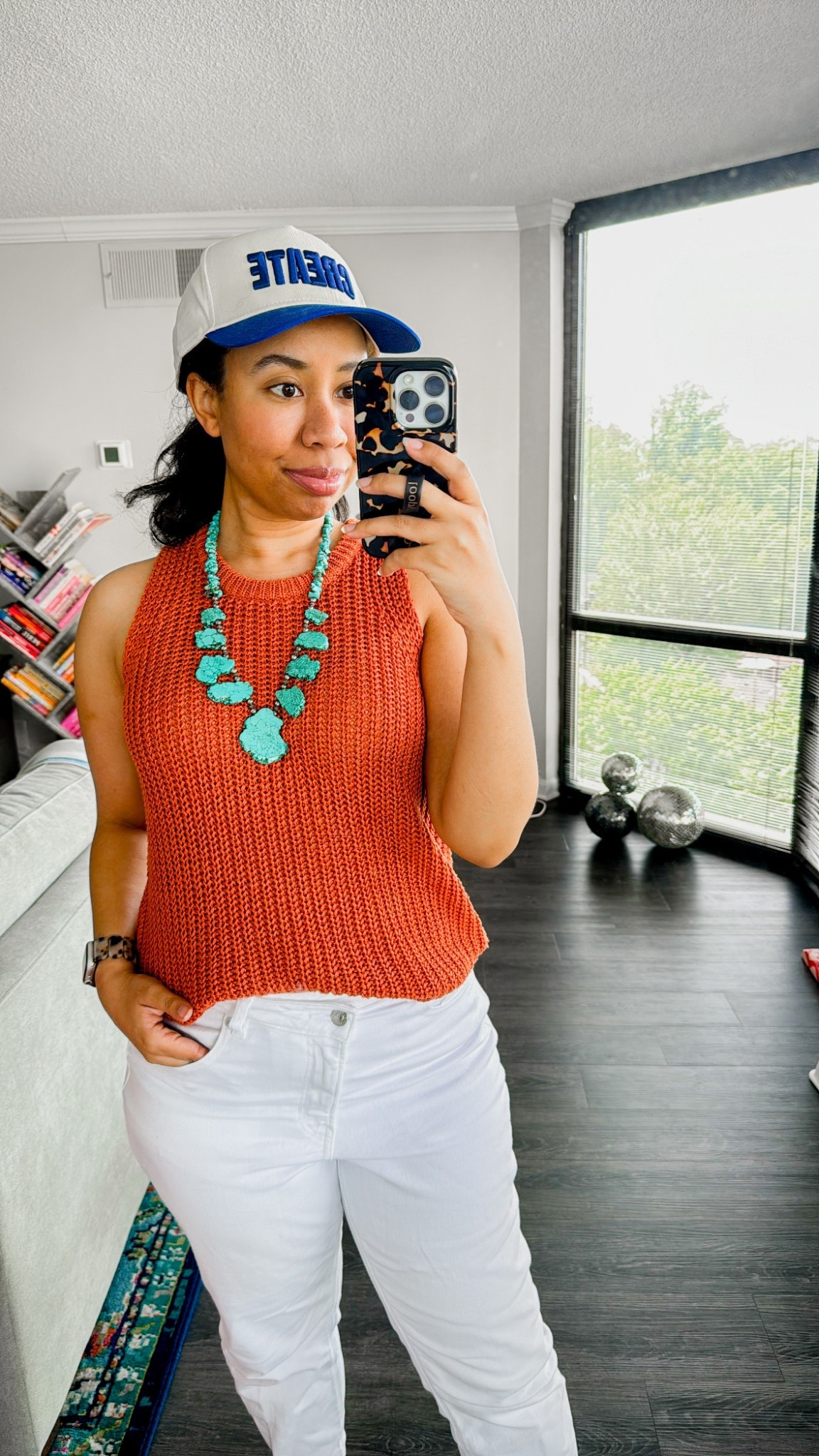 Quick look at today’s work from home outfit; orange sleeveless sweater tank, white jeans, and a pretty turquoise necklace. // sweater tank, summer sweater, white jeans outfit, cute Apple Watch band, turquoise necklace for summer

#LTKFindsUnder100 #LTKFindsUnder50 #LTKSaleAlert