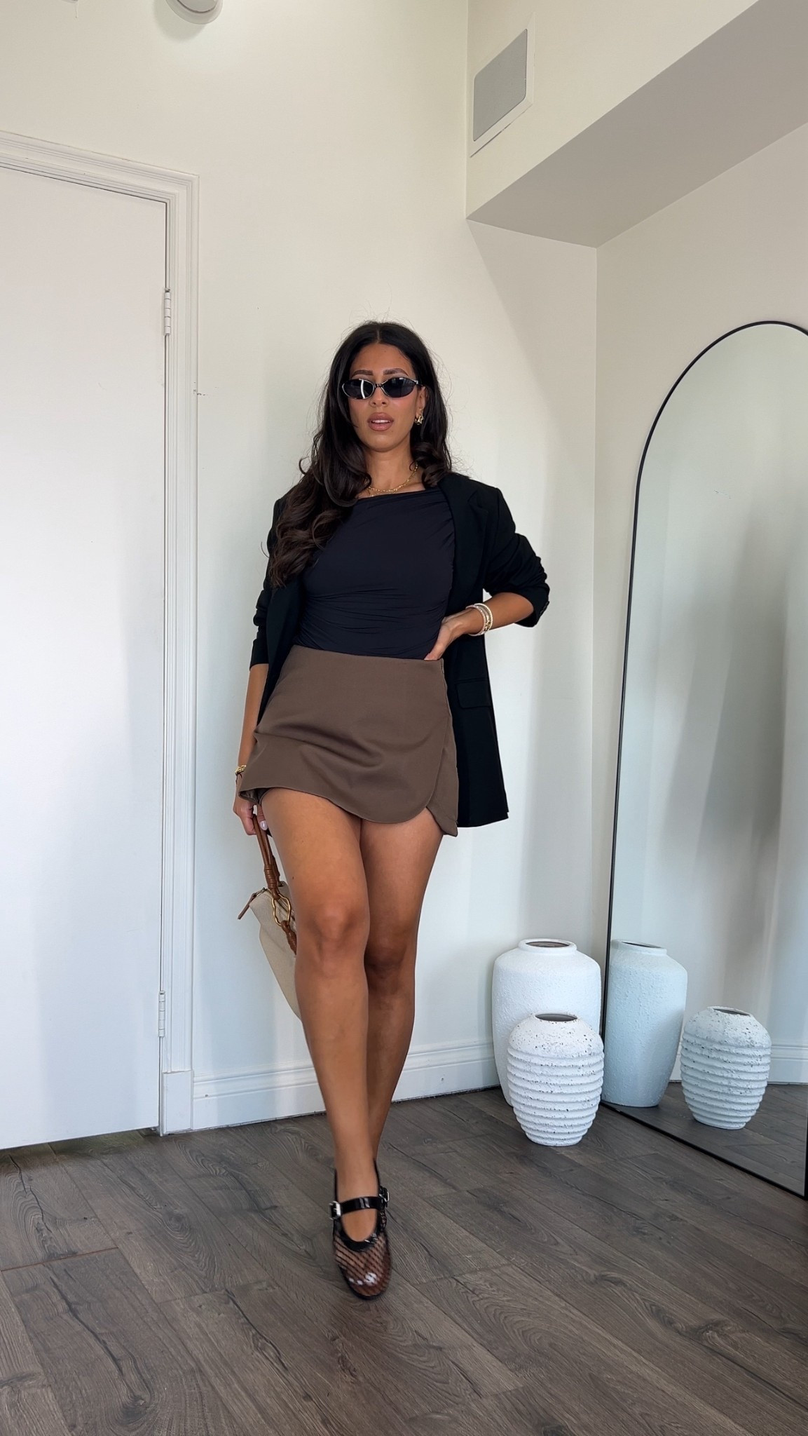 Easy summer to fall outfit idea. Small in skirt and top. Blazer large for an oversized fit.

#LTKStyleTip #LTKItBag #LTKFindsUnder50