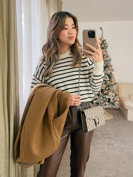 Madewell black and white striped sweater layered under a tan Abercrombie double-breasted coat with Abercrombie brown leather pants and cream heeled booties!

Top: XXS/XS
Bottoms: 00/0
Shoes: 6

#winter
#winteroutfits
#winterfashion
#winterstyle
#holiday
#giftsforher
#abercrombie 
#madewell


#LTKHoliday #LTKstyletip #LTKSeasonal
